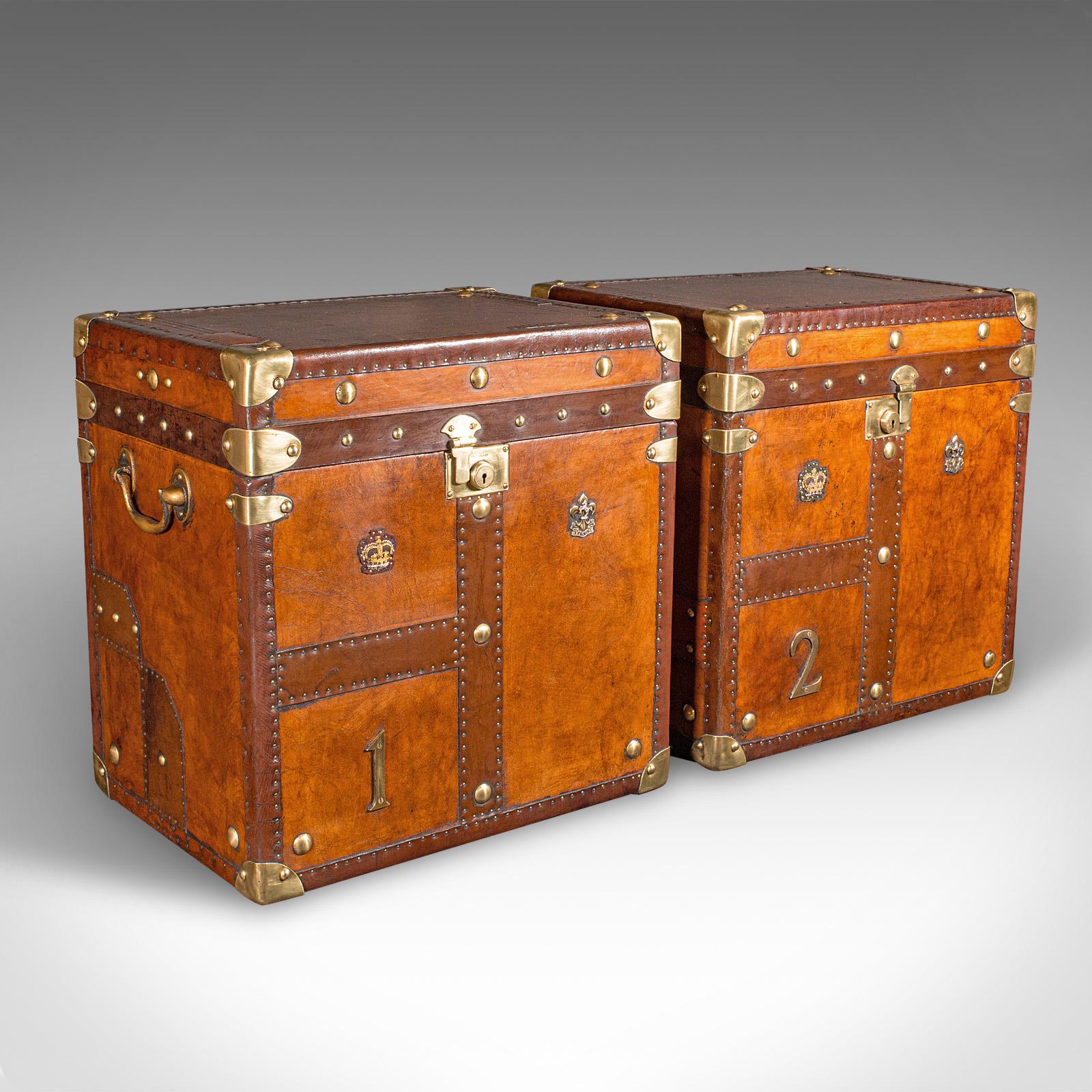 This is a pair of vintage officer's campaign luggage cases. An English, leather and brass bedside nightstand, dating to the late 20th century, circa 1980.

Exquisite casework, with beautifully appointed detail and finishes
Displaying a desirable