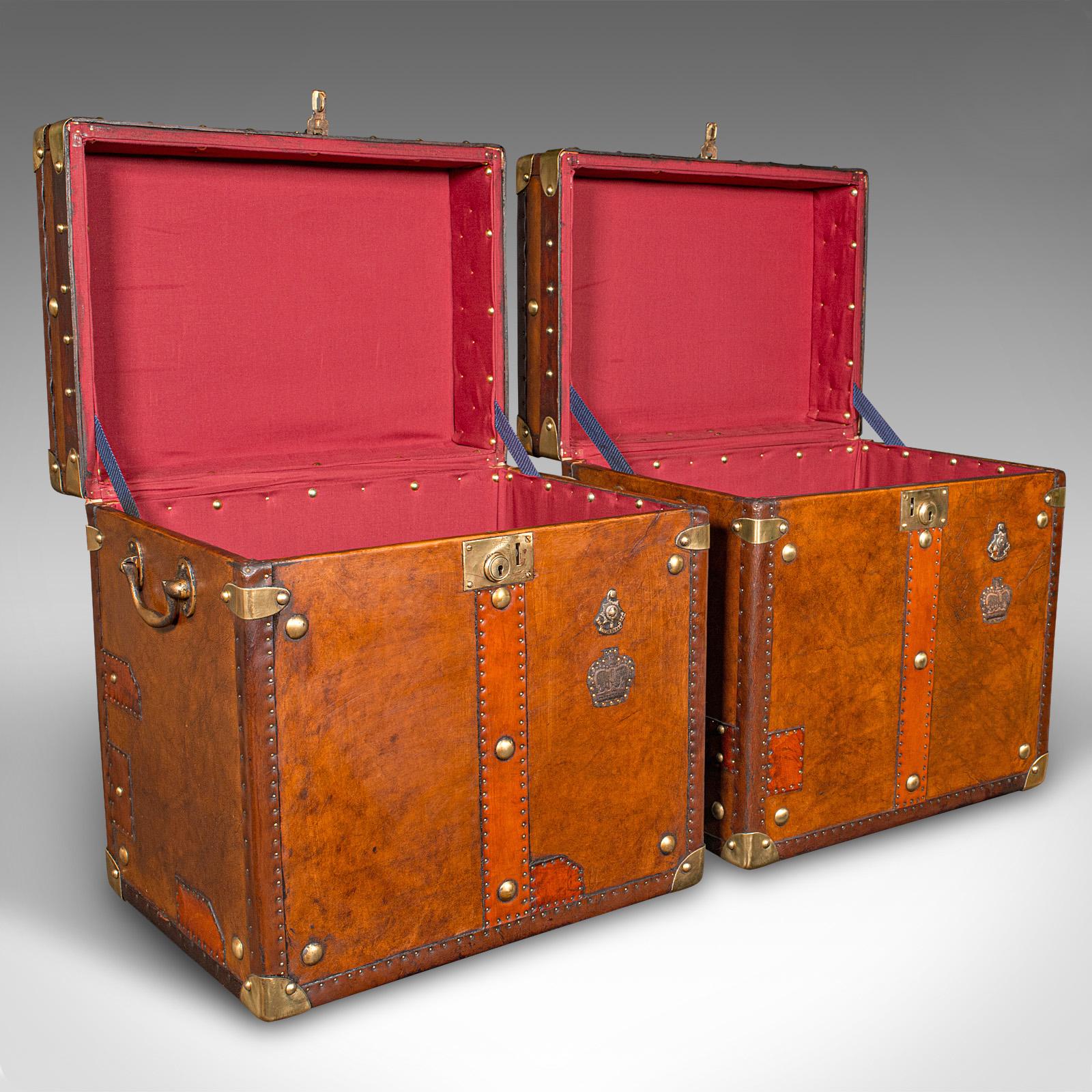 This is a pair of vintage officer's luggage cases. An English, leather and brass bound bedroom nightstand, dating to the late 20th century, circa 1980.
 
Quality casework, with beautifully appointed detail and finishes
Displaying a desirable aged