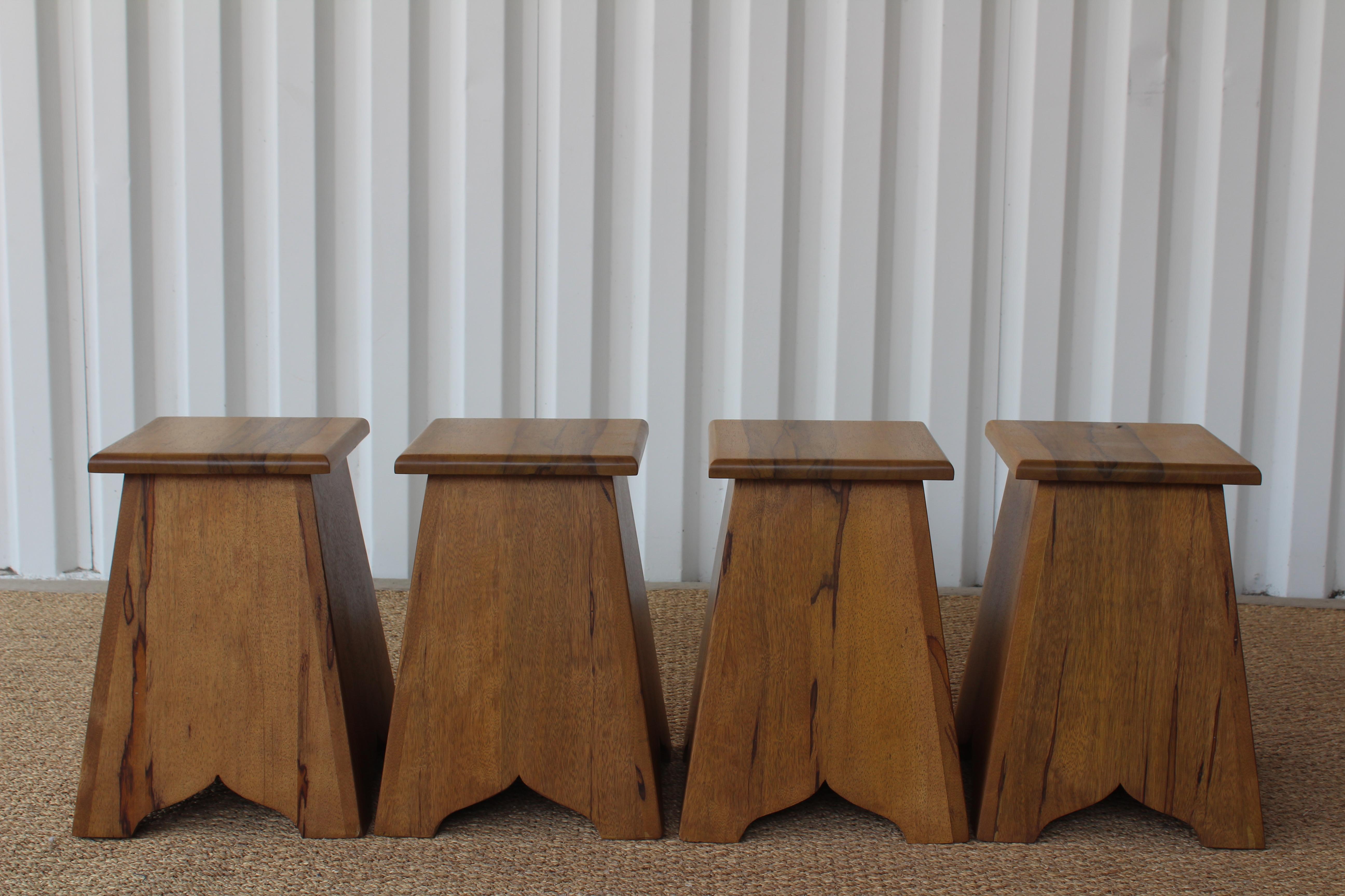Vintage solid olivewood Moroccan style end tables. Newly refinished. One pair available.