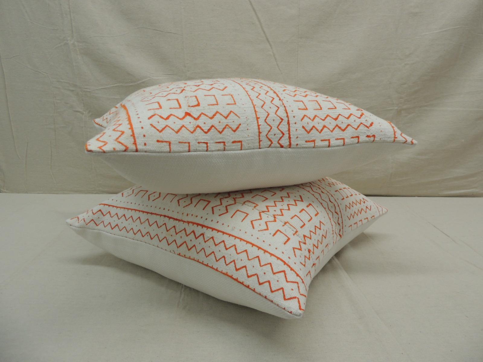 Late 20th Century Pair of Vintage Orange and Natural African Mud Cloth Square Decorative Pillows