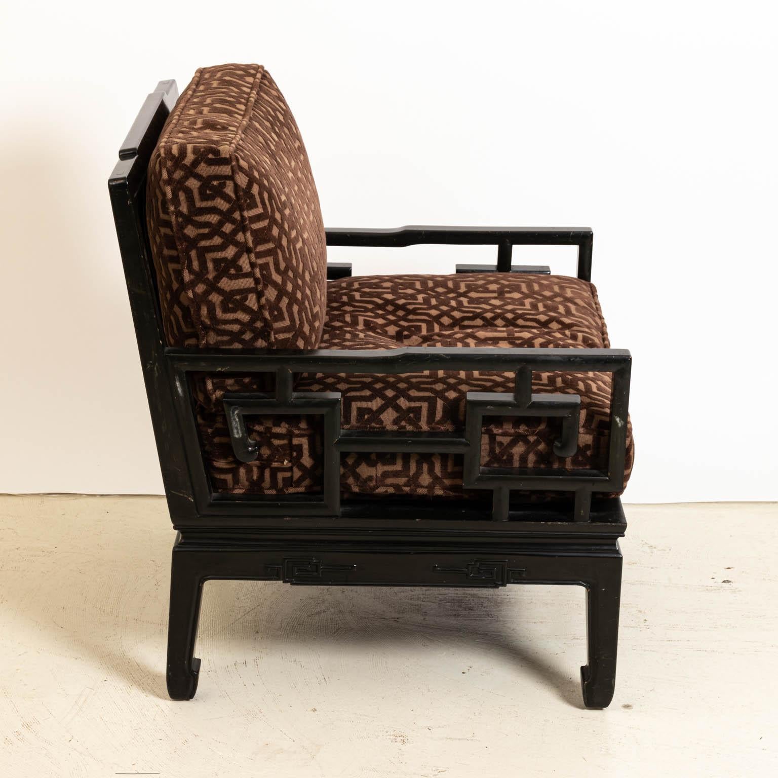 Pair of Oriental style armchairs by Baker with loose upholstered cushions, circa 1960. Made in the United States. Please note of wear consistent with age including minor paint loss.