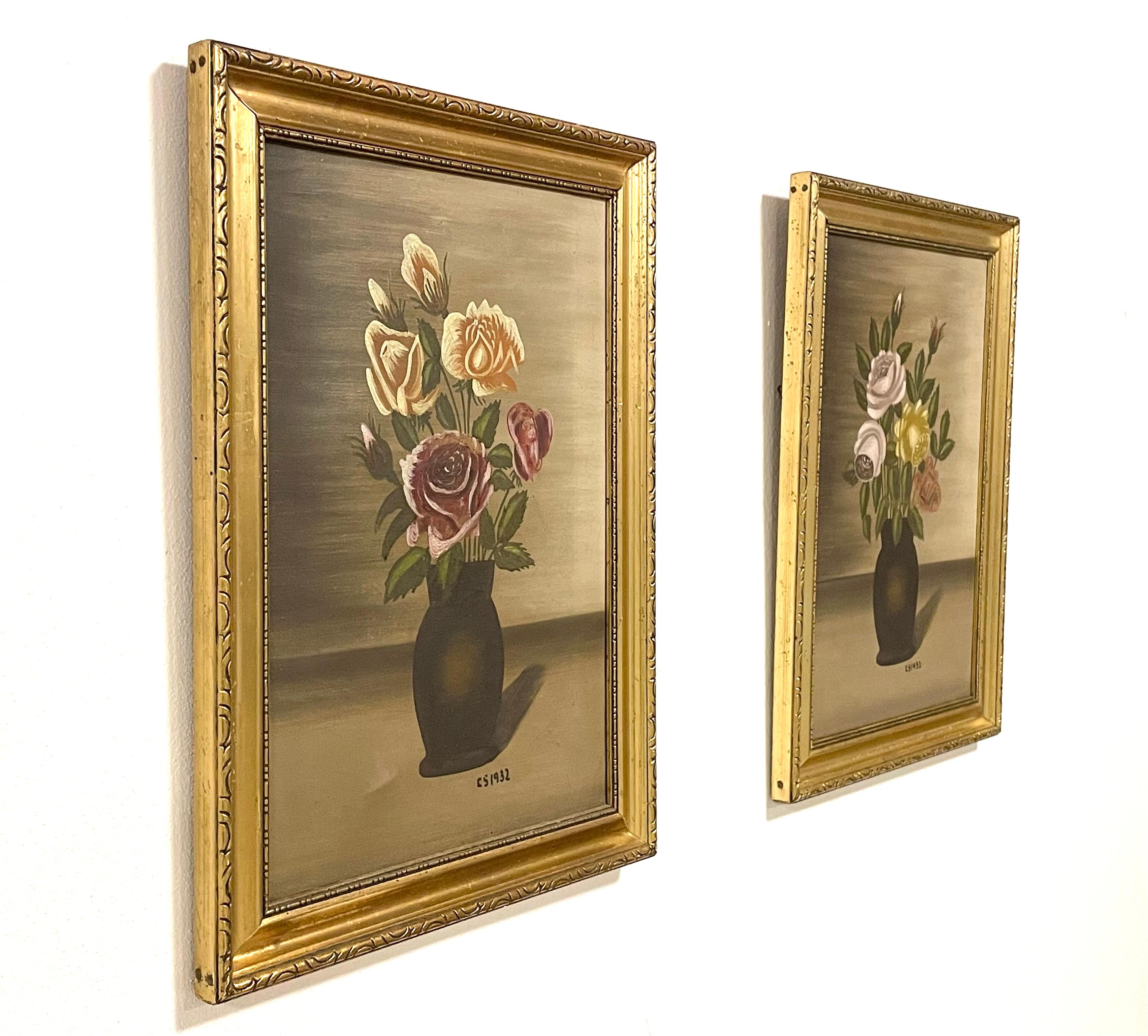 This is a pair of original Danish oil on canvas still life flower paintings from 1932 by artist CS.

They are signed by the artist in the bottom right corner and framed in beautiful gold painted solid wooden frames.

The paintings are in good
