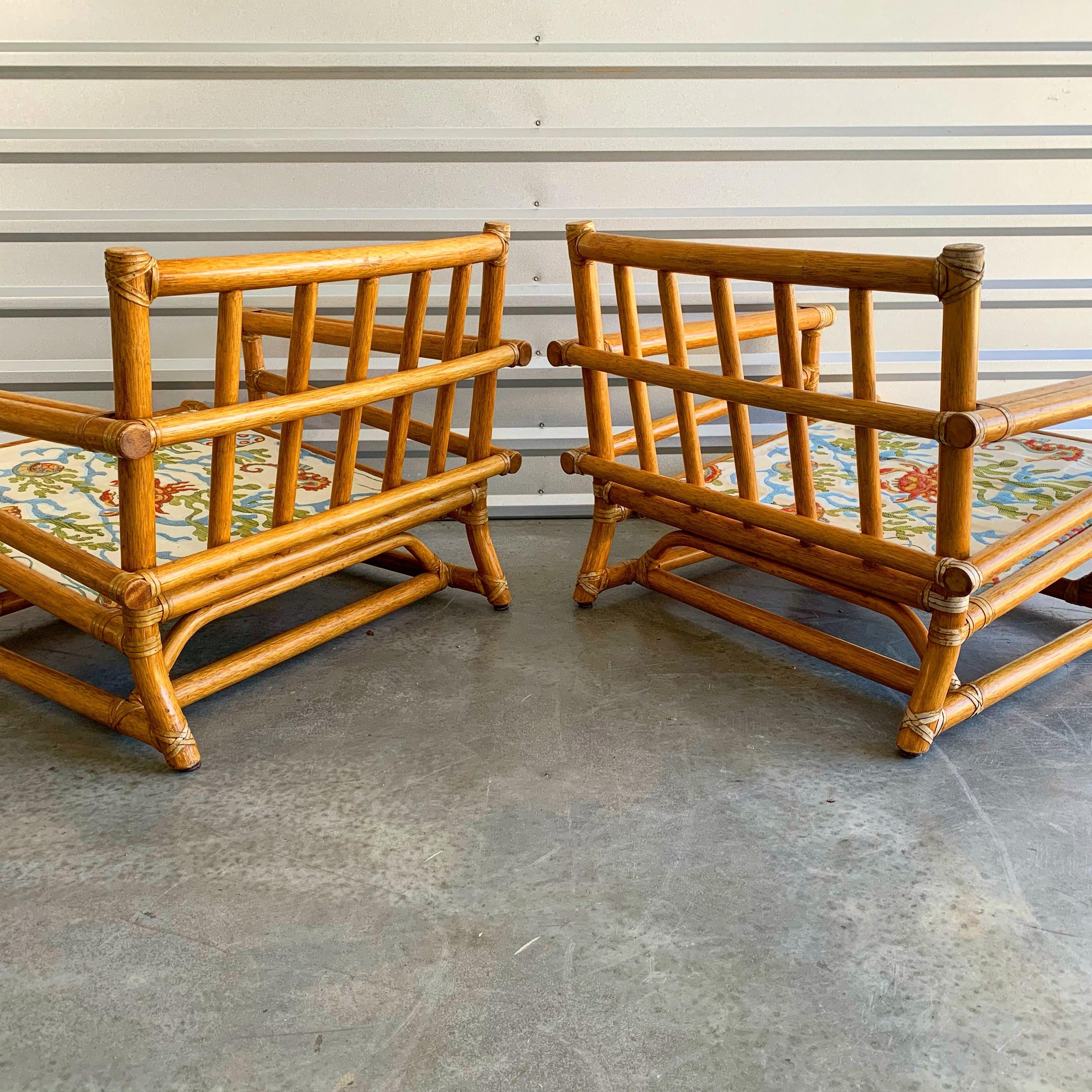 Late 20th Century Pair of Vintage Oversized Rattan Bamboo McGuire Lounge Chairs and Ottoman