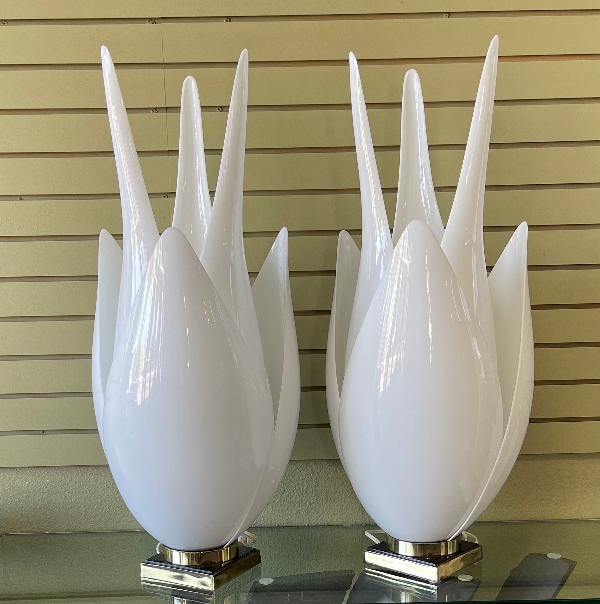 Spectacular pair of vintage oversized “Tulip” lamps designed and manufactured by Roger Rougier in Canada, circa 1970s. The pair are in very good vintage condition with no cracks to the acrylic and measure an impressive 17