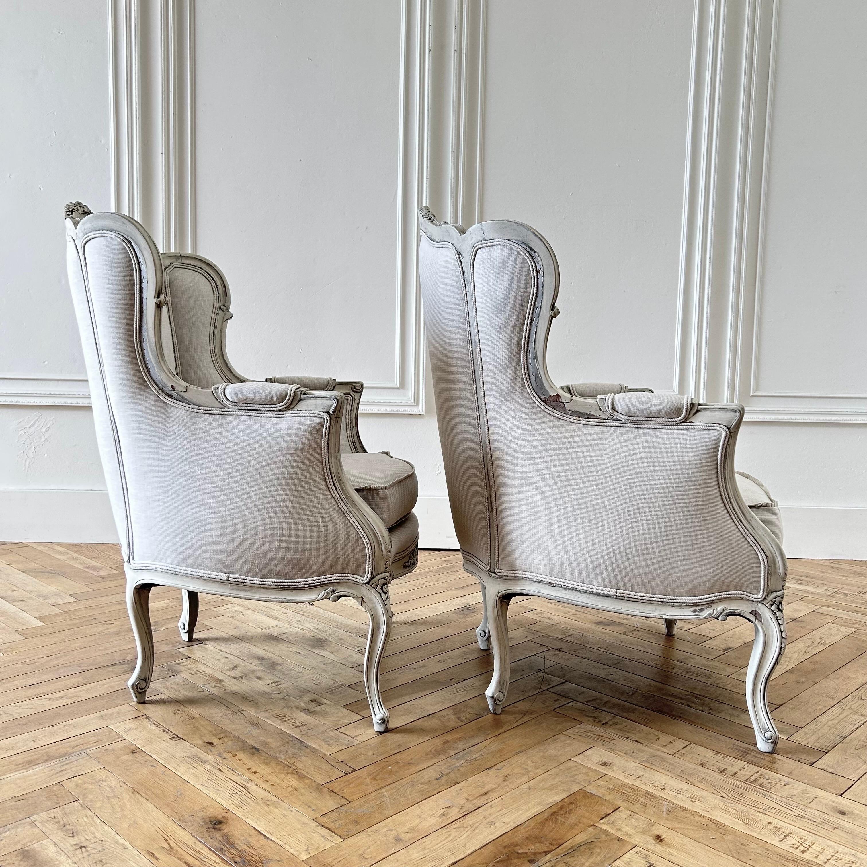 Pair of Vintage Painted and Linen Upholstered wingback Chairs For Sale 1