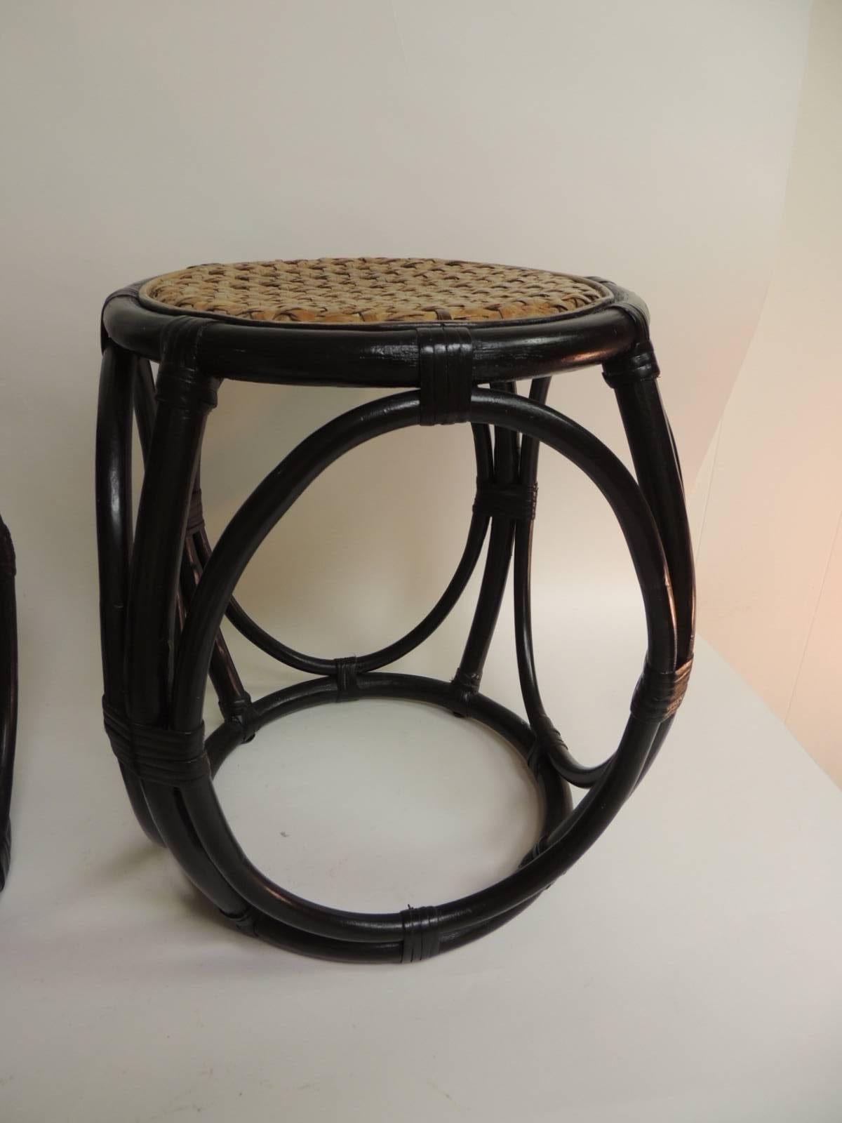Pair of vintage painted bent bamboo tabourets with wicker woven seats. Round painted black stools with natural color woven wicker seats (in excellent conditions) very sturdy.
Size: 13 x 13 x 17 H.