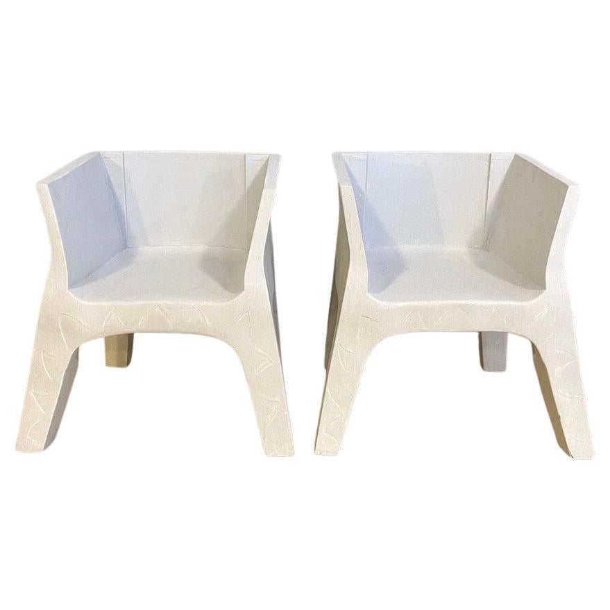 Coppia di poltrone vintage in legno intagliato e verniciato