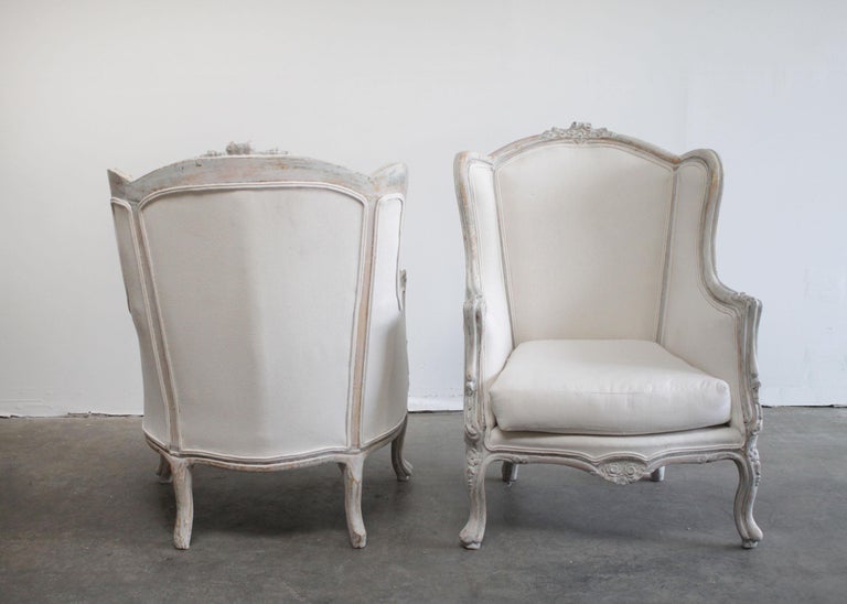 Pair of Vintage Painted French Style Wing Back Bergere Chairs at 1stDibs