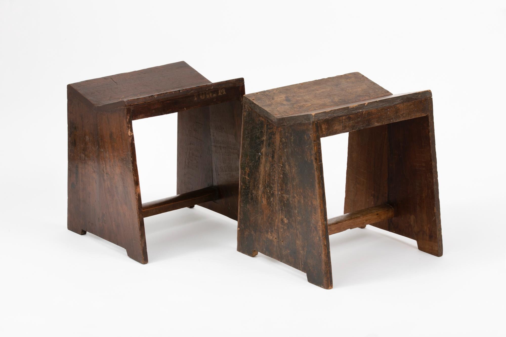 Original architectural teak sewing stools designed by Pierre Jeanneret. These stools were created for the famous modernist capital city of Chandigarh, India that was designed by Le Corbusier, Jeanneret, and their team. Model number PJ-SI-68-A. The