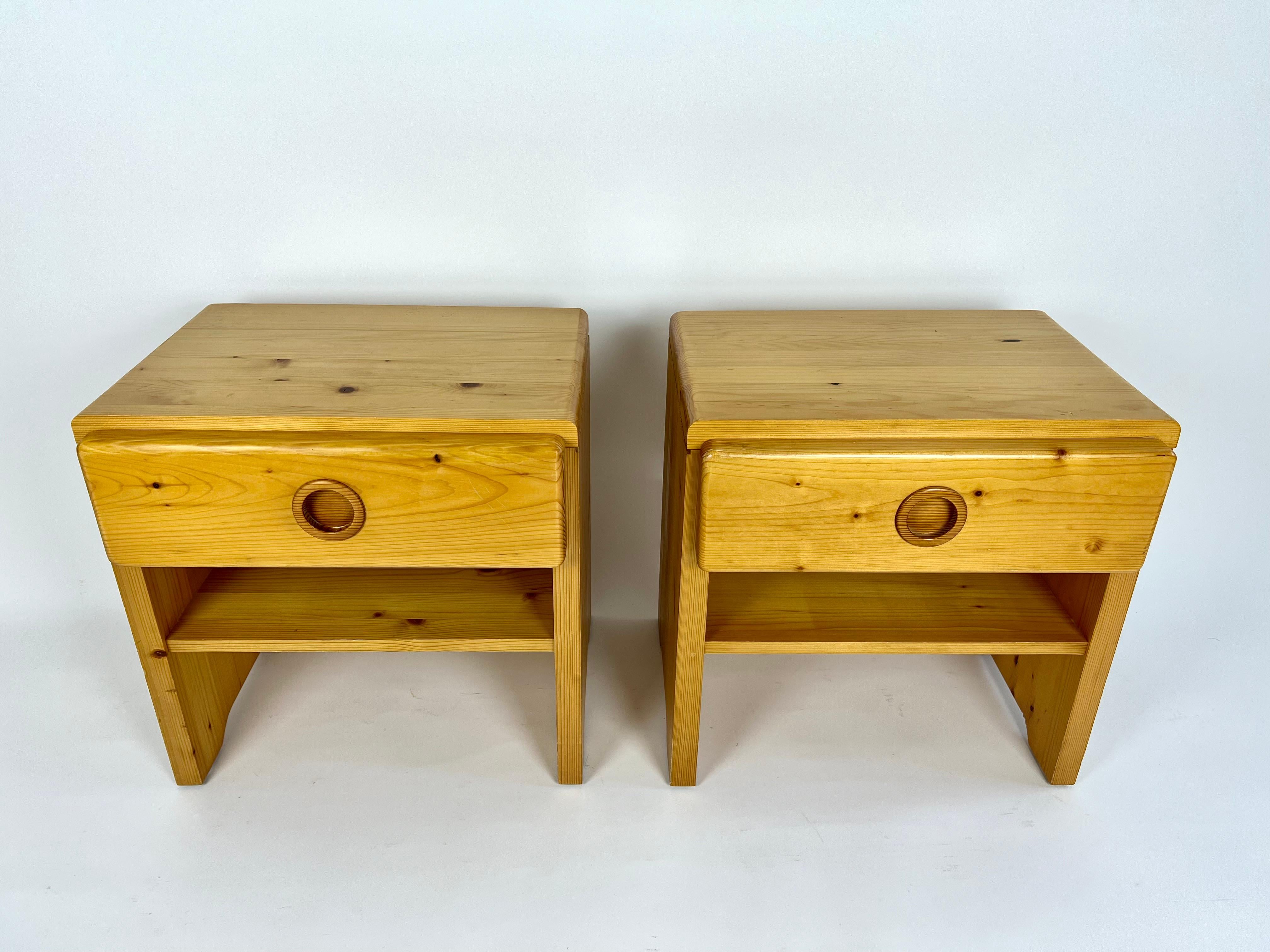 Pair of Charlotte Perriand pine bed side tables / night stands.

Sourced from an apartment clearance in the alpine resort of Arc 1600, France.

Very good vintage condition, great colour to the pine. No damage, minor signs of age and use as pictured,