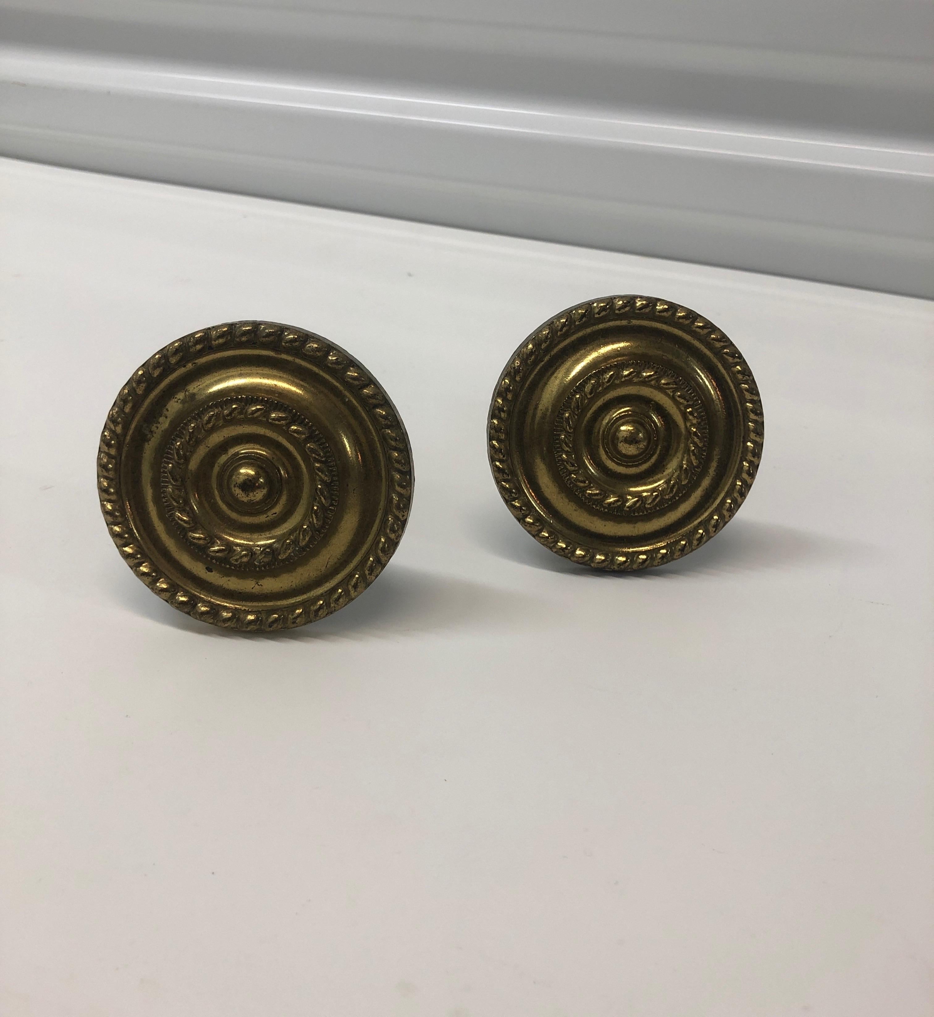 Pair of vintage polished brass curtain tiebacks
Size: 3”D x 3.5”D.