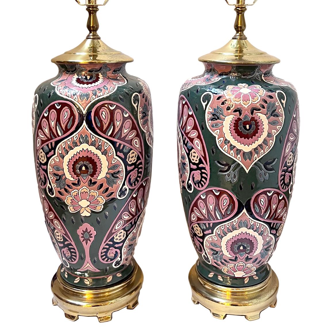 Pair of circa 1960's French paisley porcelain lamps.

Measurements:
Height of body: 19.5