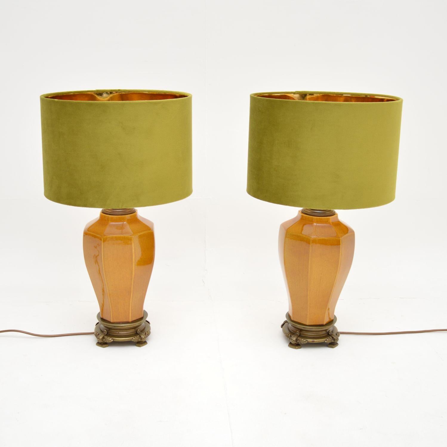 A stunning pair of vintage porcelain table lamps, made in England, and dating from around the 1960’s.

They are of amazing quality, with great proportions and a gorgeous colour tone to the porcelain glaze. They sit on beautifully designed brass