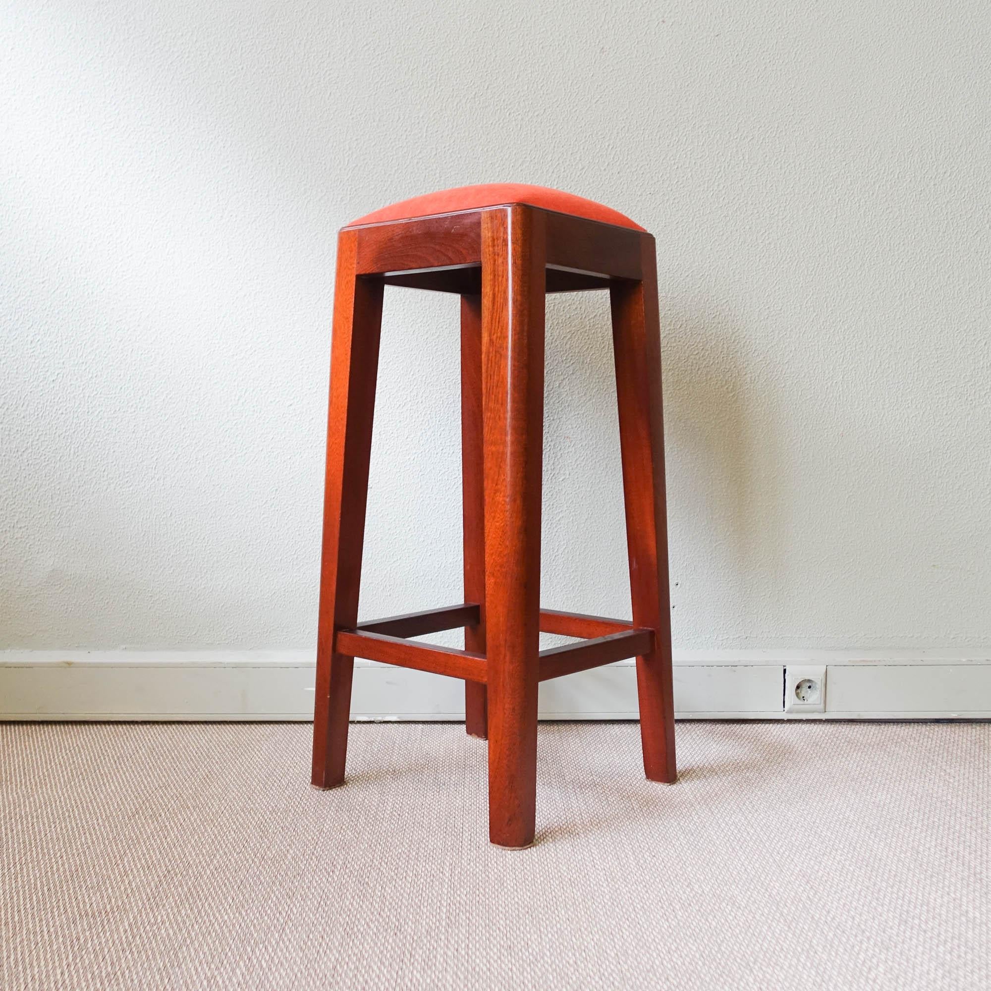 This pair of stools were designed and produced in Portugal, during the 1960's. They are made of solid mutenye, and were reupholstered with a new orange fabric. The wood was cleaned. In original and good vintage condition. Two pairs available. Price