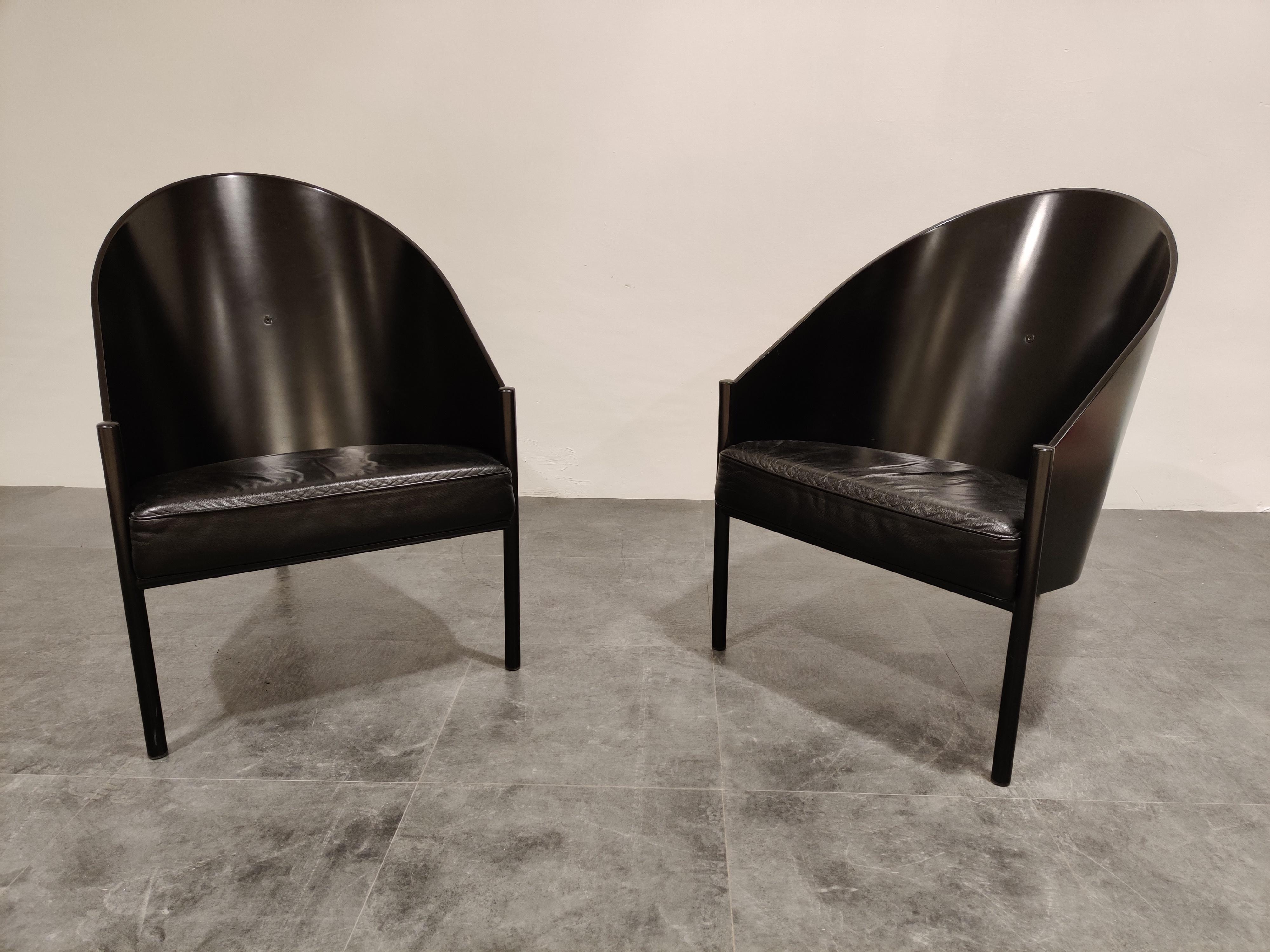 Pair of rare 'pratfall' lounge chairs designed by Philippe Starck for Aleph.

These chairs were designed in 1982 and are a large version of the Costes dining chairs designed for the Café costes in Paris.

Beautiful elegant and timeless