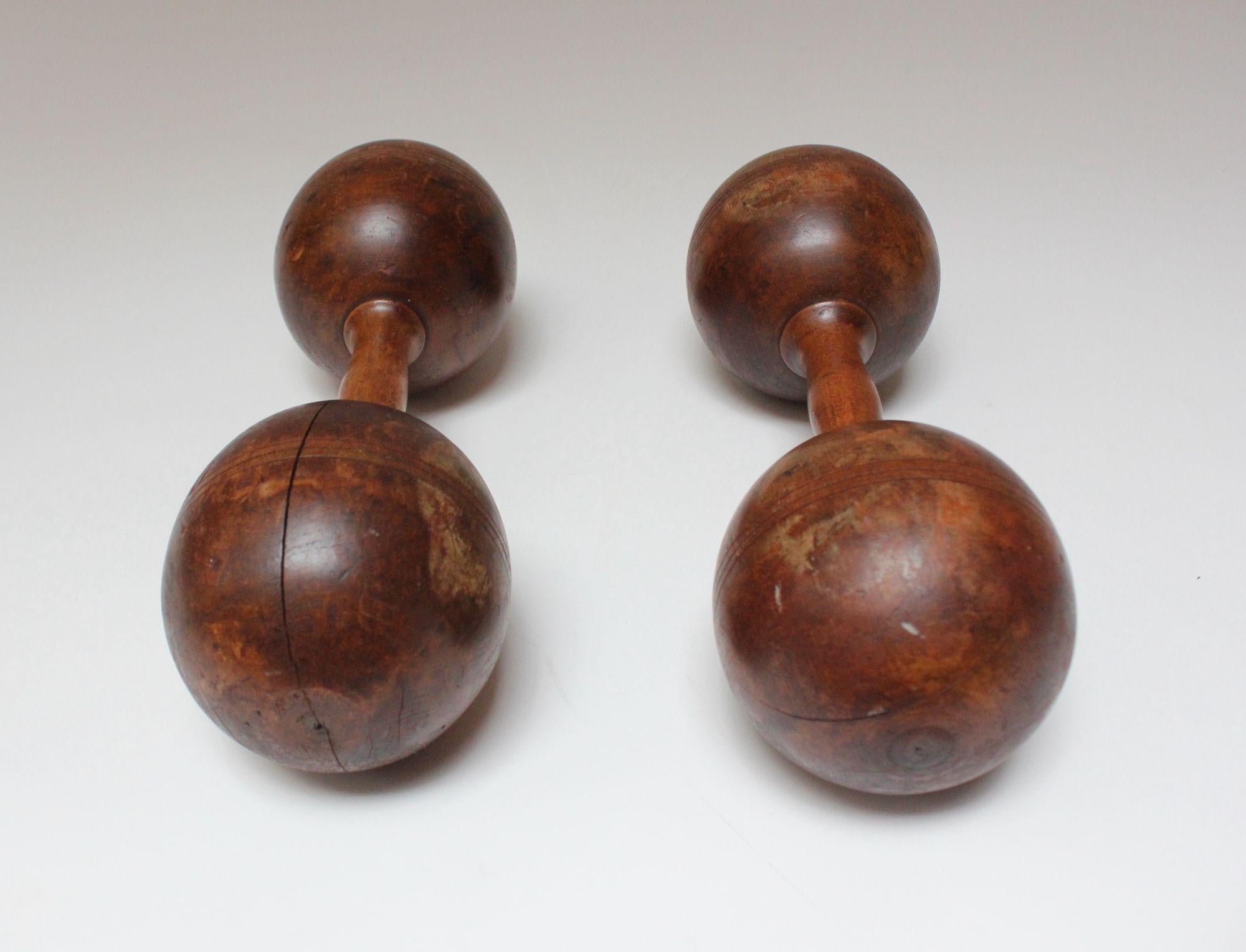 Pair of Vintage Primitive Oversized Hand Weights/Dumbbells In Distressed Condition For Sale In Brooklyn, NY