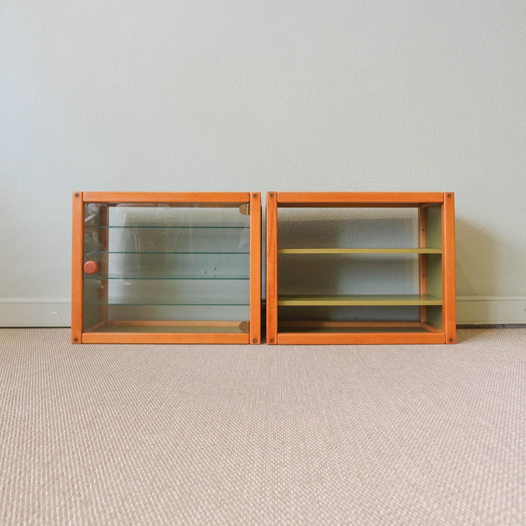 This pair of Glass Storage Units from the Profilsystem Collection, was designed by Elmar Flötotto for Flötotto, in Germany, during the 1980's. The principle behind the Profilsystem it is simple. The modules can be easily combined with one another.