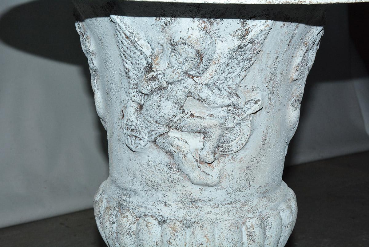 Iron Pair of Vintage Putti Decorated Garden Urns For Sale
