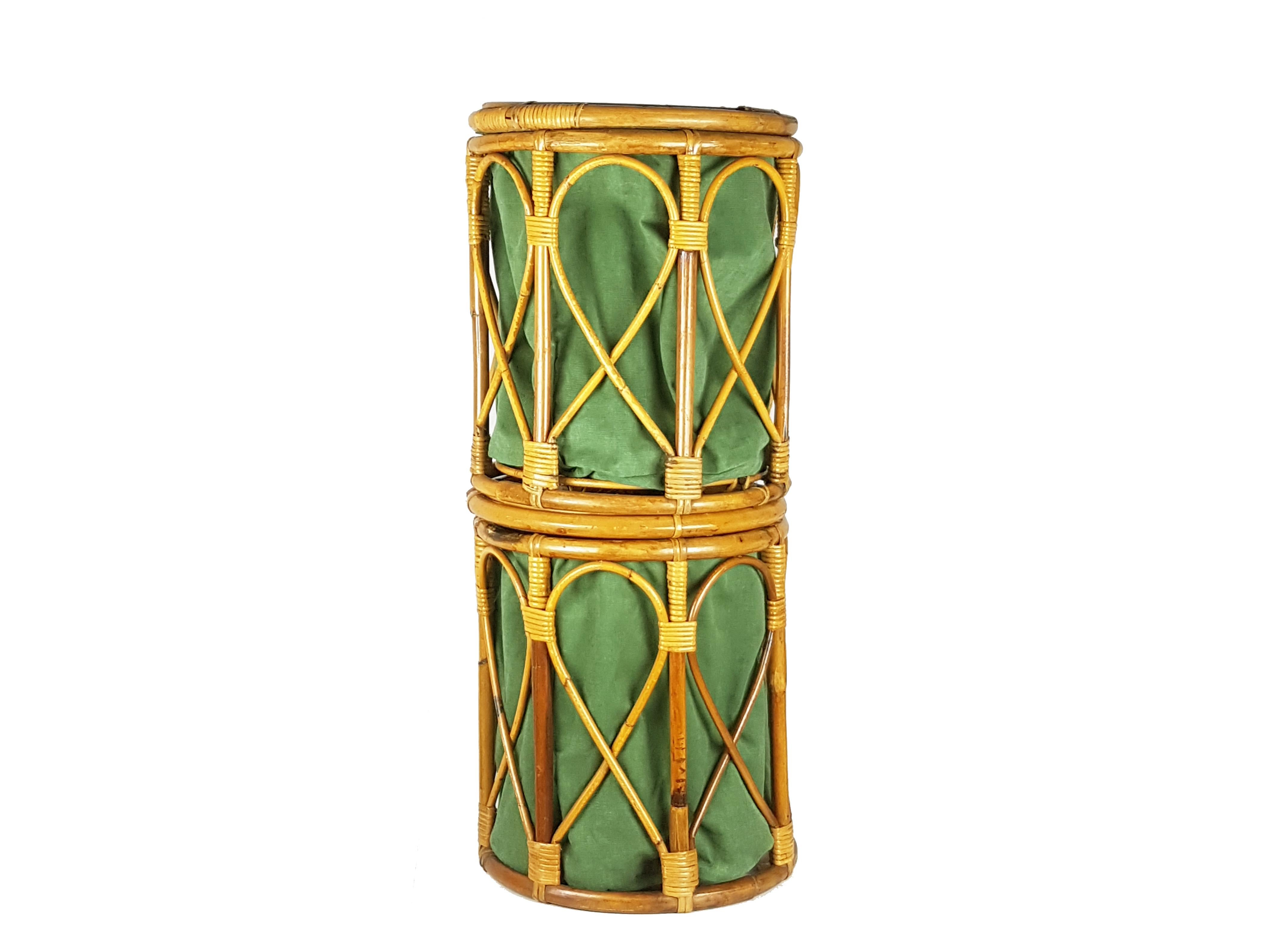 These vintage stools/baskets are made from a cylindrical rattan structure with a green fabric bag. They can be used as stools, a magazine racks or as a generic containers. Good vintage condition: wear consistent with age and use. Minor rattan losses