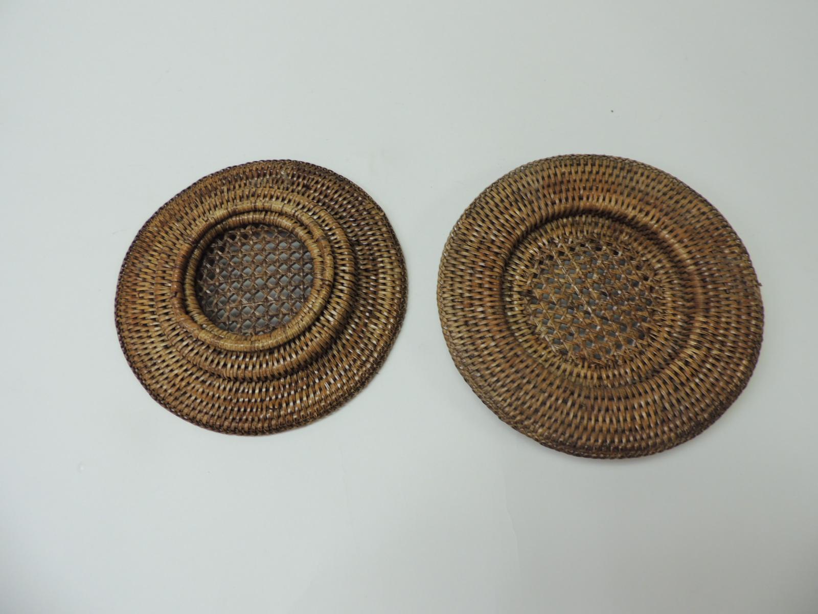 Pair of vintage round rattan woven wine bottle coasters.
Size: 8D x 1H.