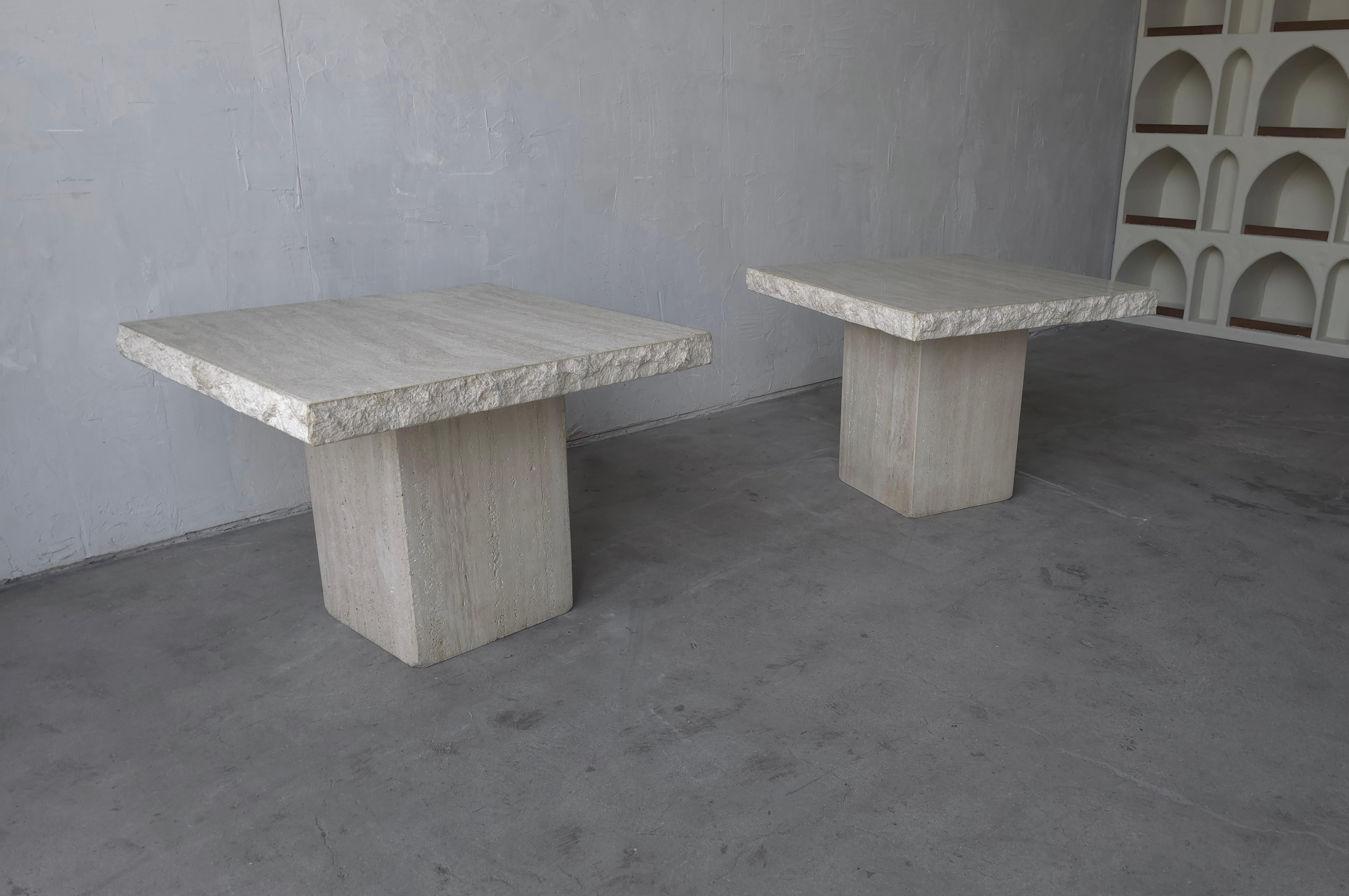 Lovely pair of 1980's square honed travertine side table with raw edge detail.

Tables are in excellent condition, showing only minimal signs of wear from age and use.  Nothing I'd consider damage.