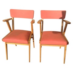 Pair of vintage red leatherette armchairs