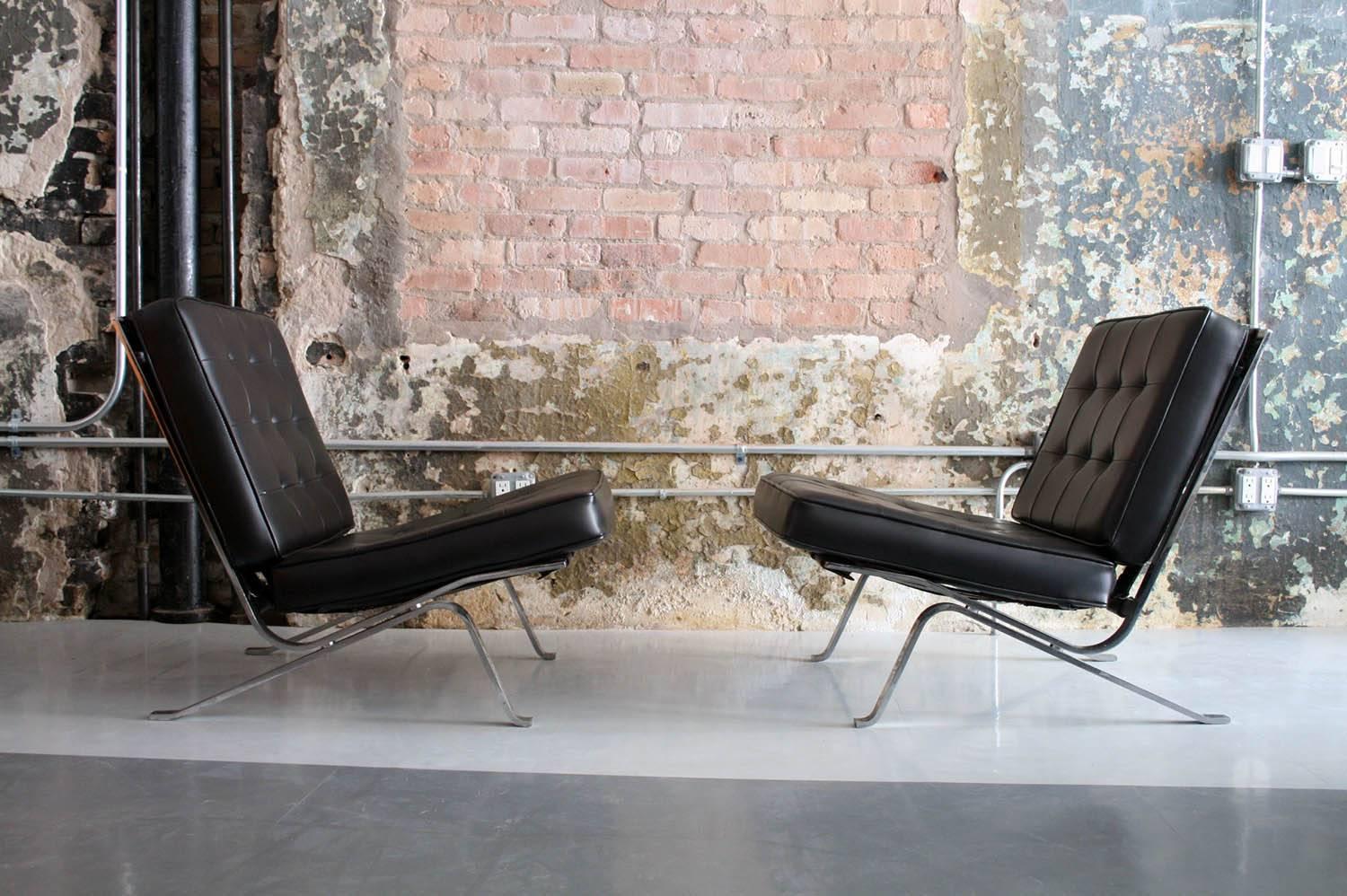 Pair of vintage RH-301 lounge chairs by Robert Haussmann for De Sede, 1954.

Pair of vintage RH-301 flat bar lounge chairs in original upholstery designed by Robert Haussmann for De Sede. Hand built in the 1950s this rare lounge chair has a chrome