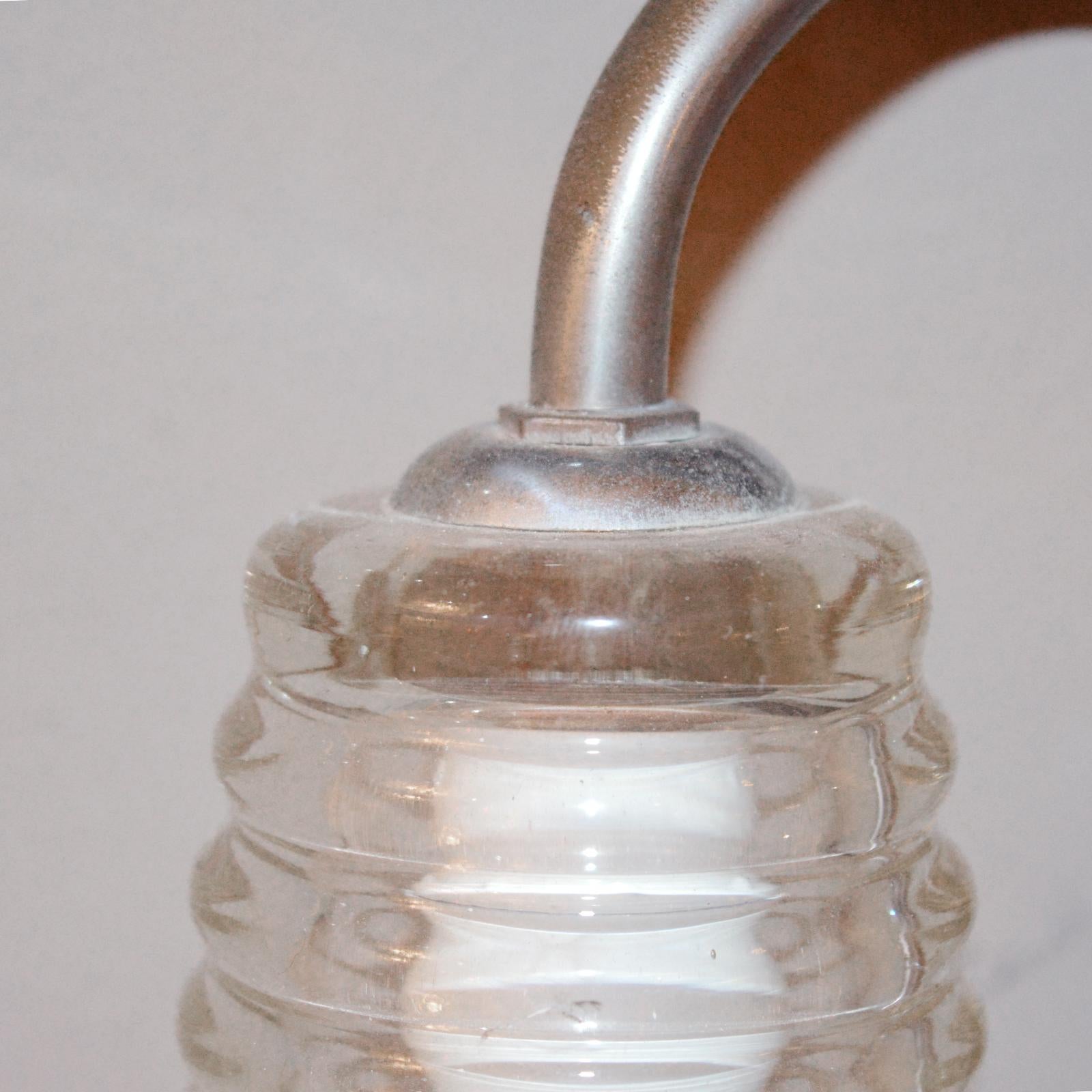 Pair of vintage ribbed glass sconce.