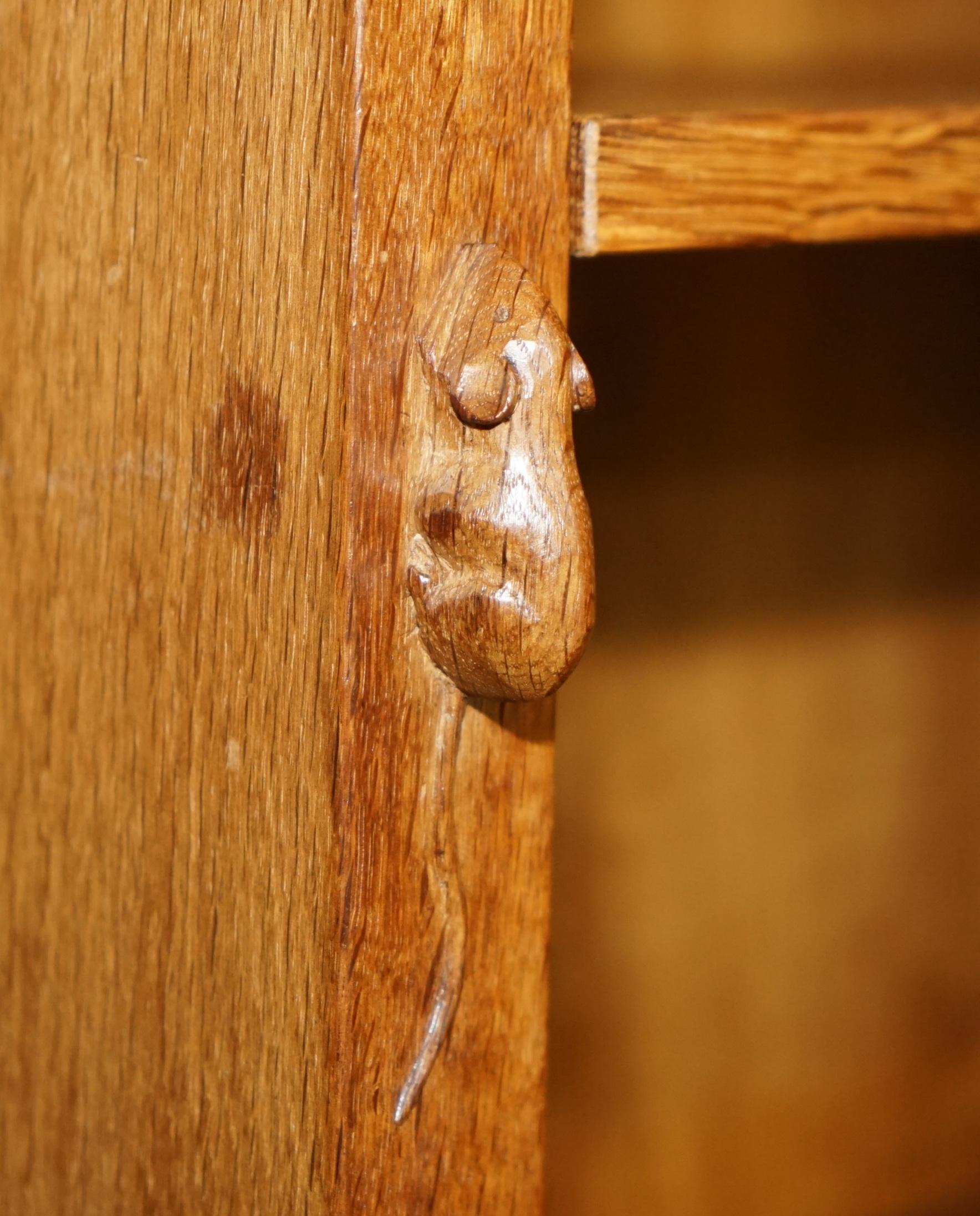 English PAIR OF ViNTAGE ROBERT MOUSEMAN THOMPSON ENGLISH OAK CARVED LIBRARY BOOKCASES For Sale