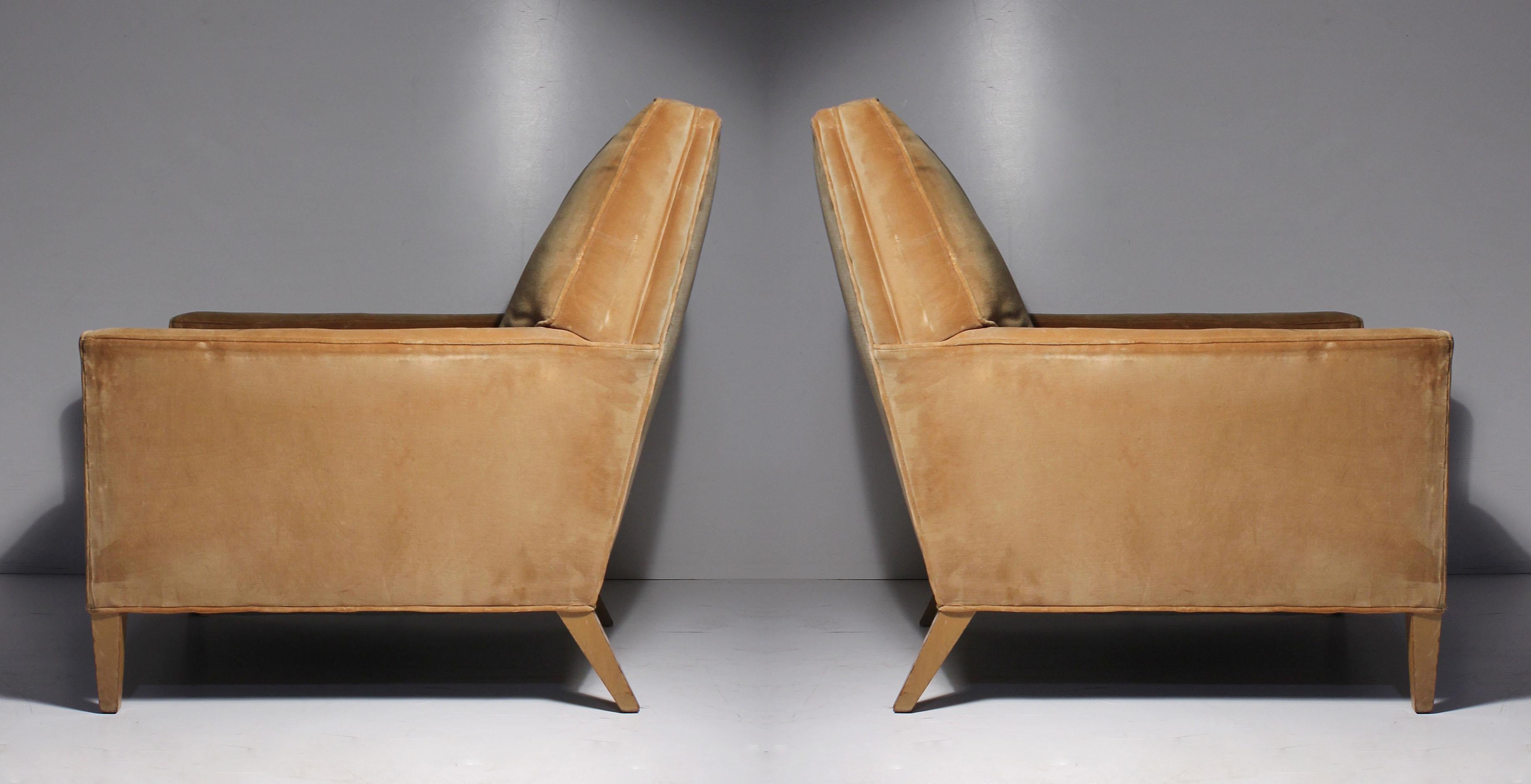 Pair of Vintage Robsjohn Gibbings lounge chair for Widdicomb. Beautiful proportions. A more uncommon deep lounge form. Tapered front and back legs. Elegant and Modern.

Recently acquired a 2nd chair that was recently upholstered in White Muslim.