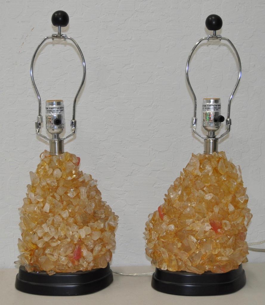 Pair of vintage rock crystal lamps, circa 1970s

Fabulous lacquered rock crystal lamps.

Each lamp is made from a large collection of rock crystals and then lacquered.

Dimensions 5 1/2