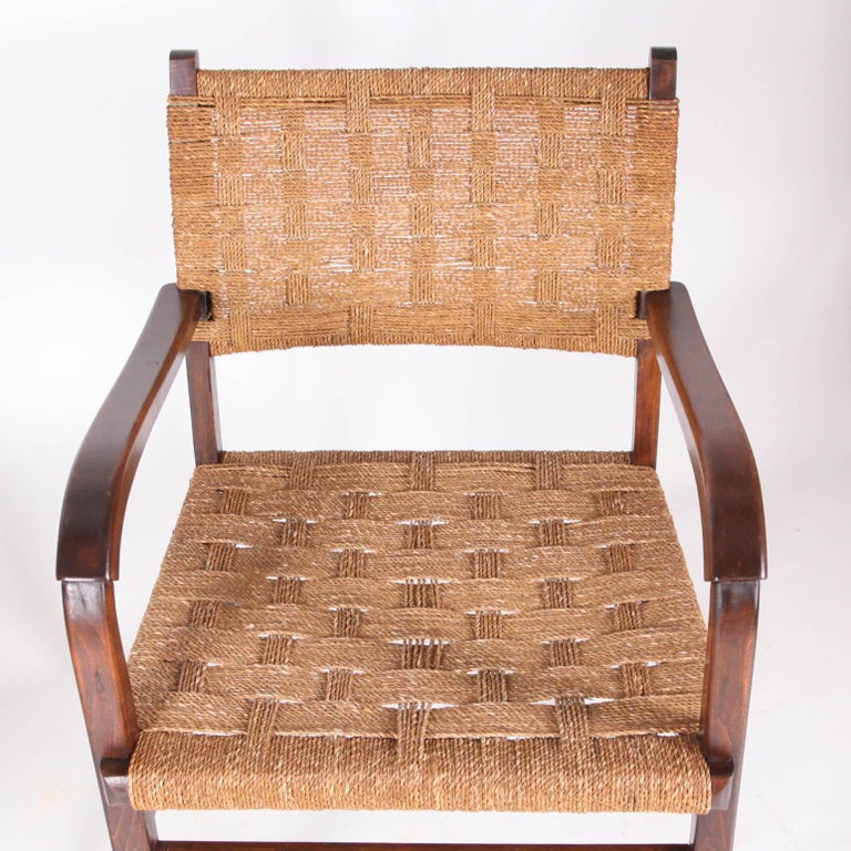 Paire of rope and wooden armchairs in very good condition.