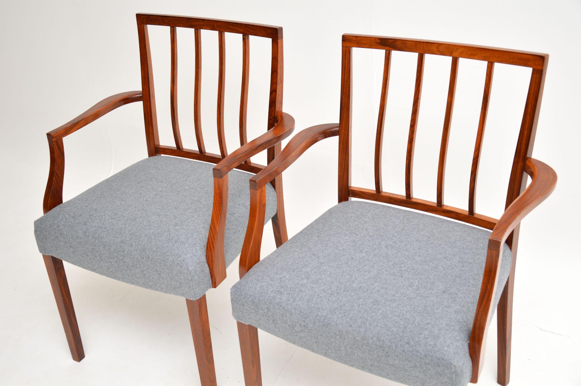 A stunning and very rare pair of carver chairs. These were designed by Robert Heritage as part of the Dorrington range, they were made by Archie Shine in London during the 1960’s.

The quality is superb, these are beautifully designed and executed.