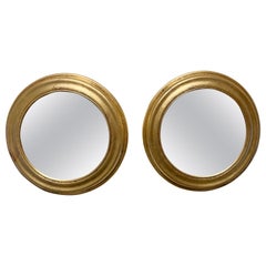 Paire de miroirs italiens ronds et dorés vintage