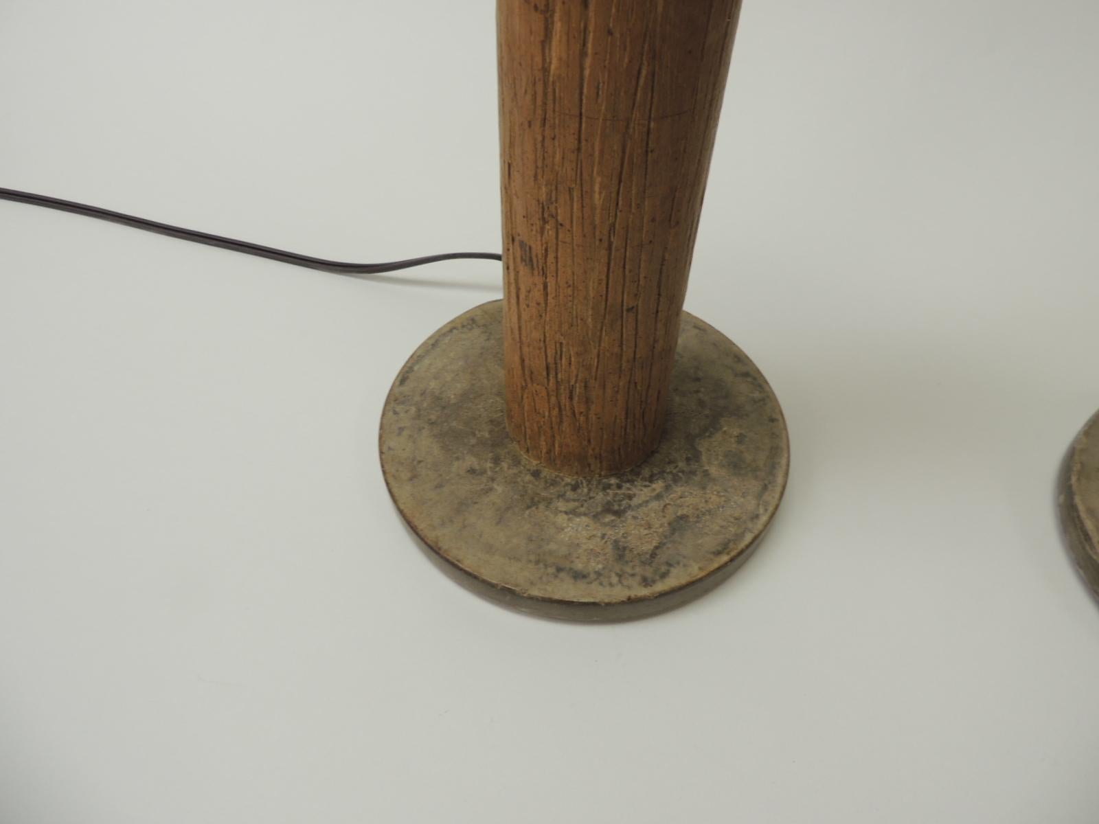Pair of vintage wood found object table lamps.
Vintage wood found object table lamp. Boobing spool wood table lamp with silver color socket and cord. Up to 60 watts. Turn on/off switch on top. USA, 1980s.
Size” 6 x 6 x 17 H.