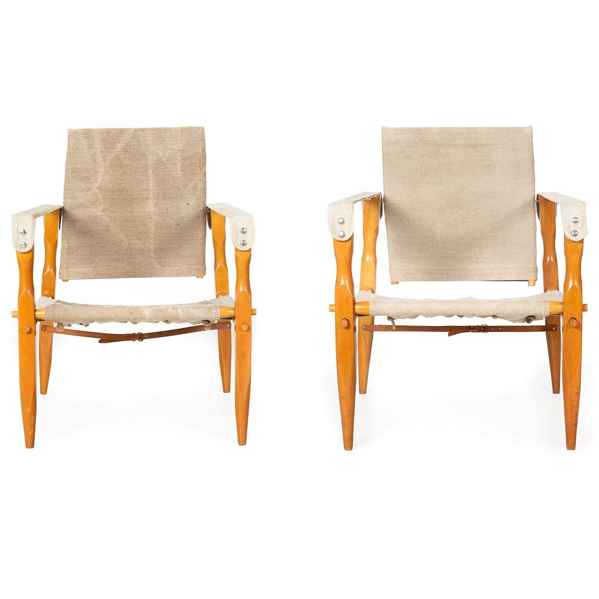 PAIR OF SCADINAVIAN SAFARI CHAIRS
With original cotton canvas upholstery, unmarked, circa 1970s
Item # 301XUJ28D 

A finely made pair of Scandinavian safari chairs from the third quarter of the 20th century, they retain their original cotton canvas