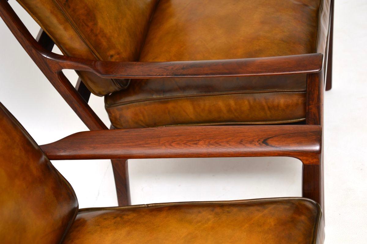 Coppia di poltrone scandinave d'epoca in palissandro e pelle di Frederik Kayser in vendita 8