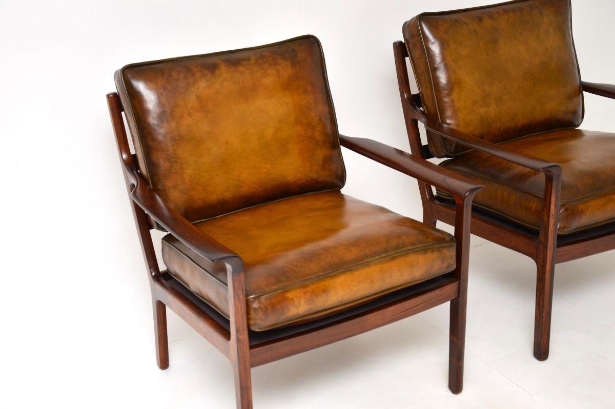 Coppia di poltrone scandinave d'epoca in palissandro e pelle di Frederik Kayser in vendita 1