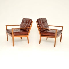 Pair of Vintage Scandinavian Walnut and Leather Armchairs by Frederik Kayser