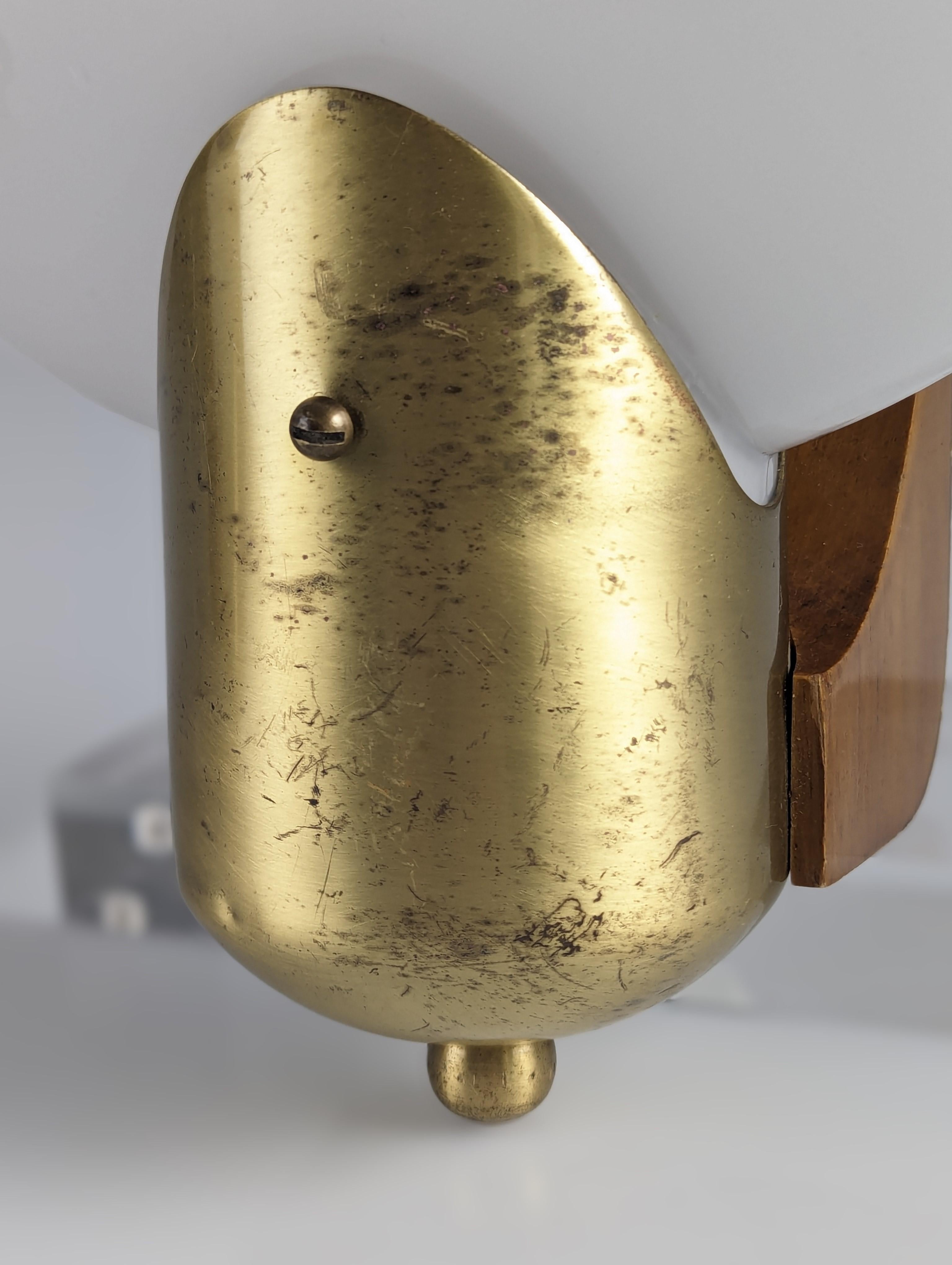 Late 20th Century Pair of vintage sconces in wood, brass and oval two-tone glass Italy 1970s