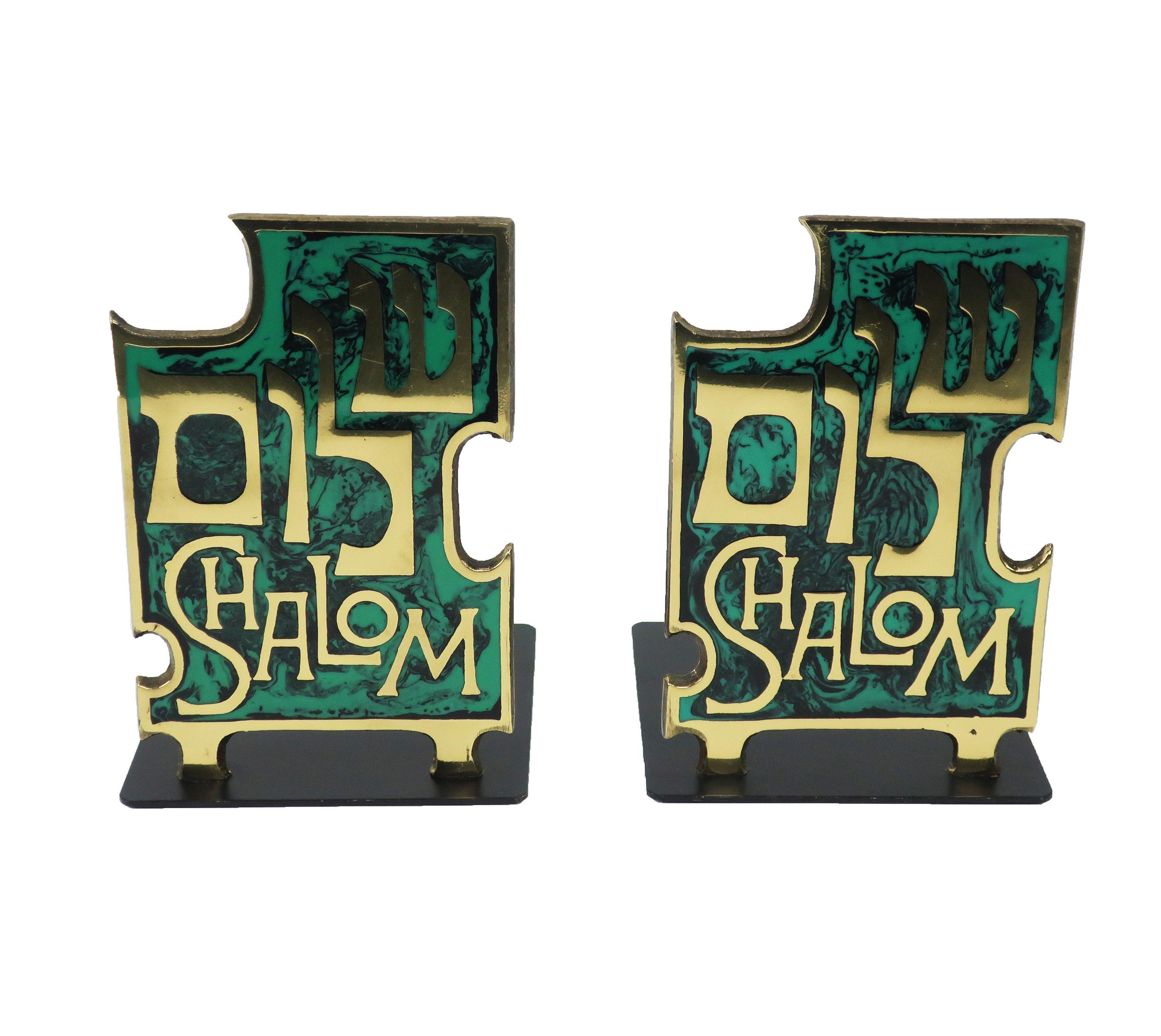 A lovely pair of Mid-Century Modern brass and enameled metal book ends with Hebrew lettering and “SHALOM” in English. Likely made in Israel in the late 1960s or 1970s.

In excellent vintage condition.
 
5