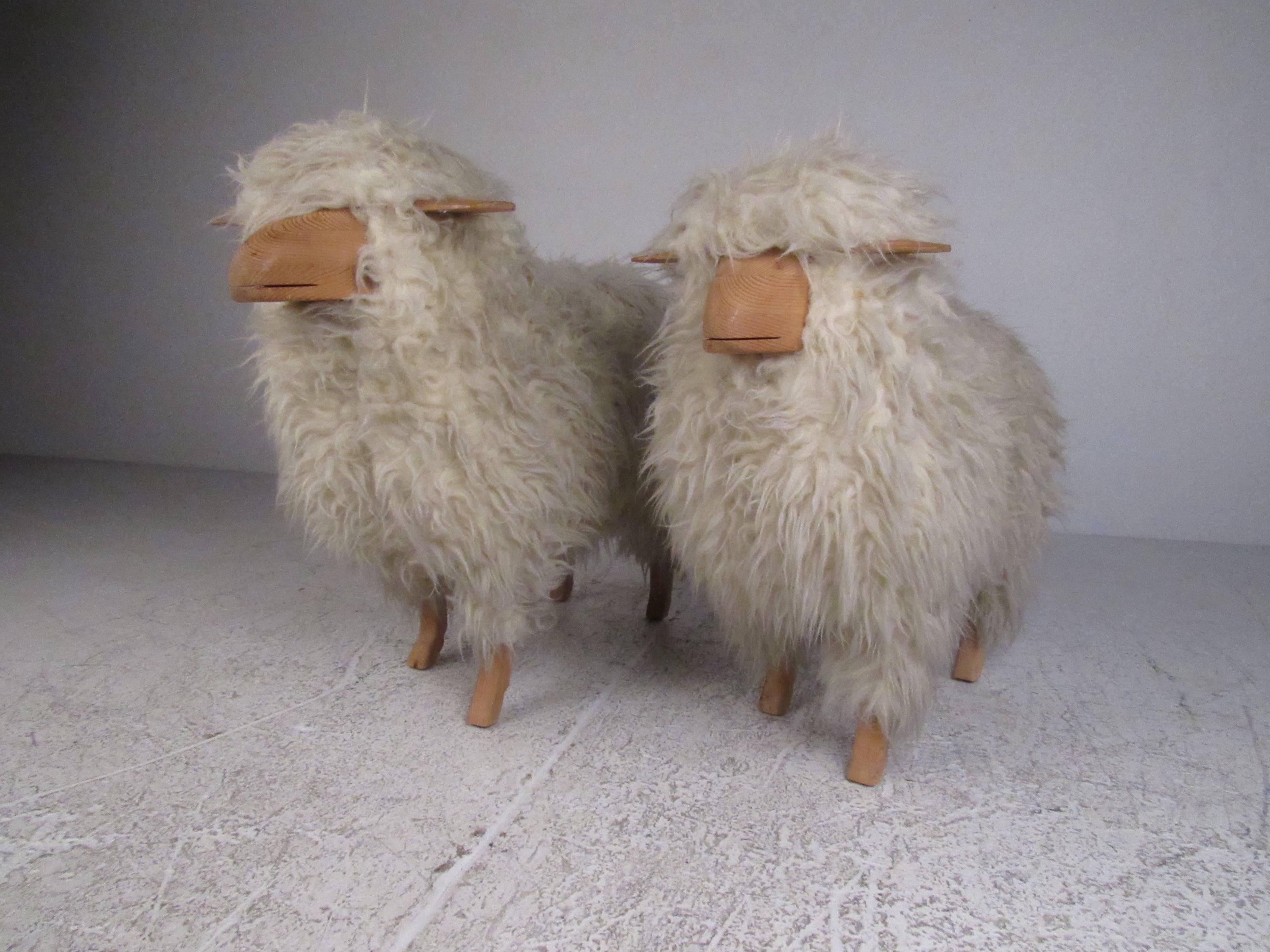This pair of matched pinewood sheep feature sheepskin covering and sculpted details. Unique pair ideal for home or shop display or use as occasional stools. Please confirm item location (NY or NJ).

Varied dimensions:

16 W x 38 D x 31 H 
14 W x 34