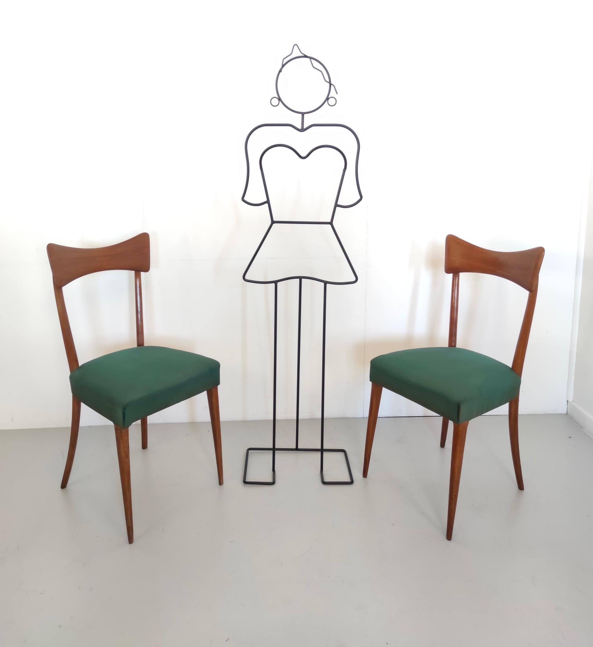 Made in Cantù, Italy, 1955.
These chairs are elegant and a nice iconic model of the Italian design. 
They feature a beech frame and a dark green suede upholstery. 
They might show slight traces of use since they're vintage, but they can be