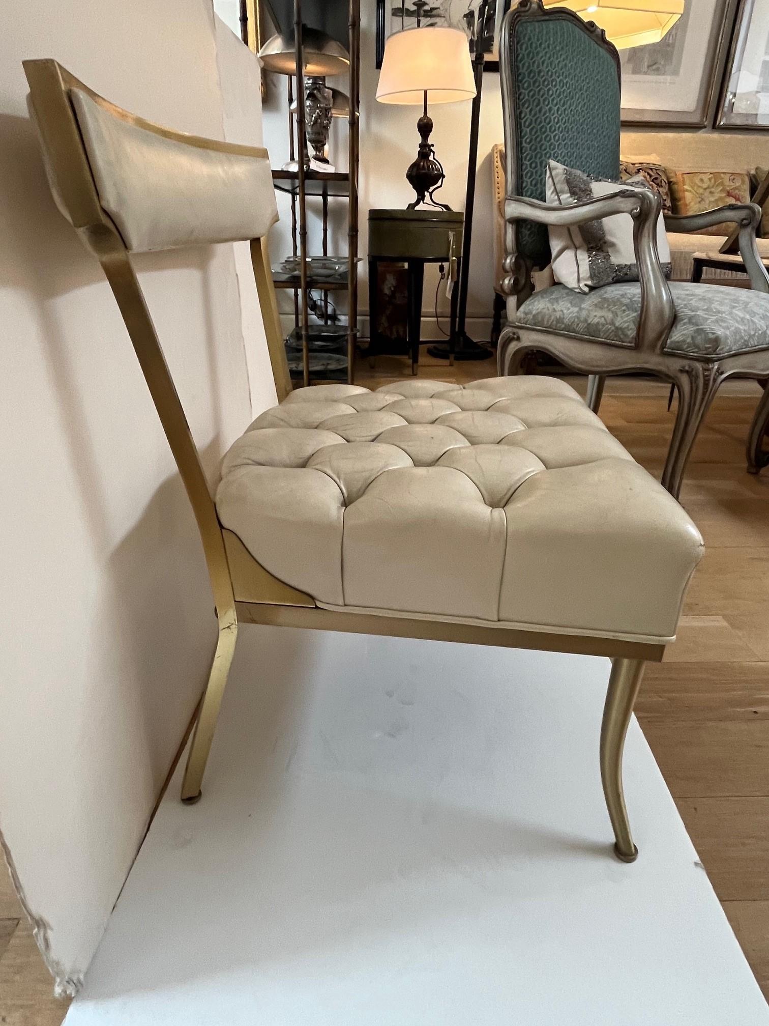 Brass Pair of Vintage Sleek Tufted Leather Klismos Chairs Designed by William Haines For Sale