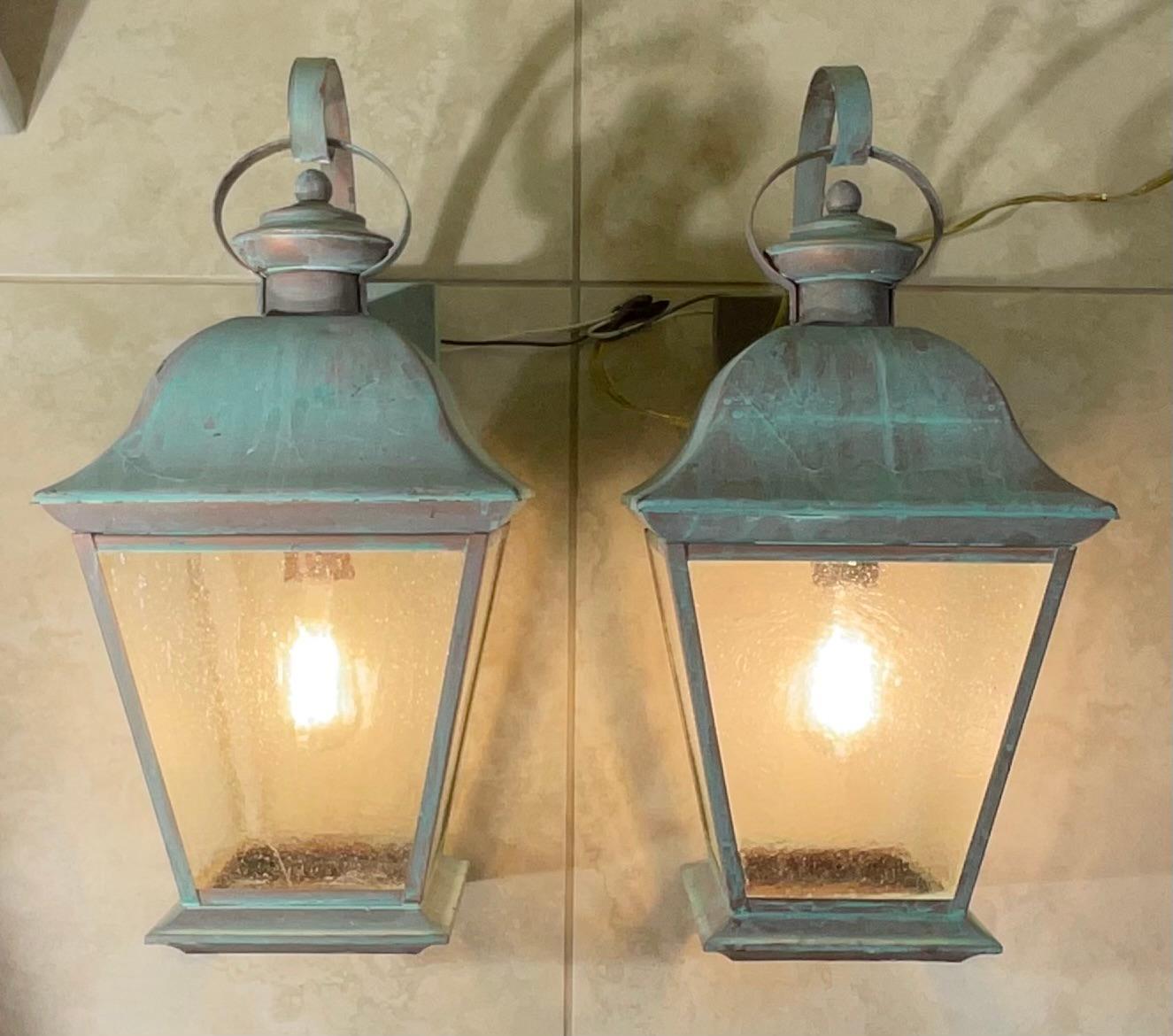 pair of vintage solid brass lanterns exudes timeless elegance and old-world charm. Crafted from , high-quality solid brass, built to last . Their classic design transcends trends, making them a perfect addition to any interior or exterior space,