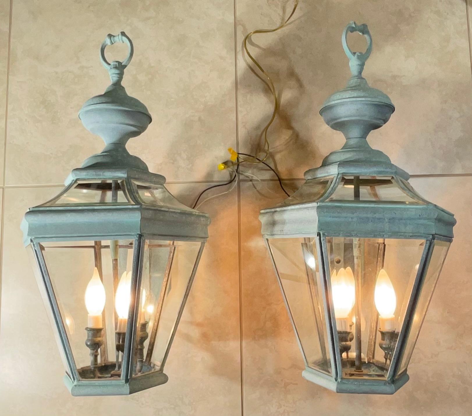 
Elevate Your Space with Timeless Charm.
These exquisite pair of vintage brass wall hanging lanterns will add a touch of classic elegance to any space. Crafted from high-quality brass ,beveled glass ,and finished in a beautiful patina, these
