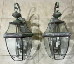 Coppia di lanterne da parete in ottone massiccio vintage