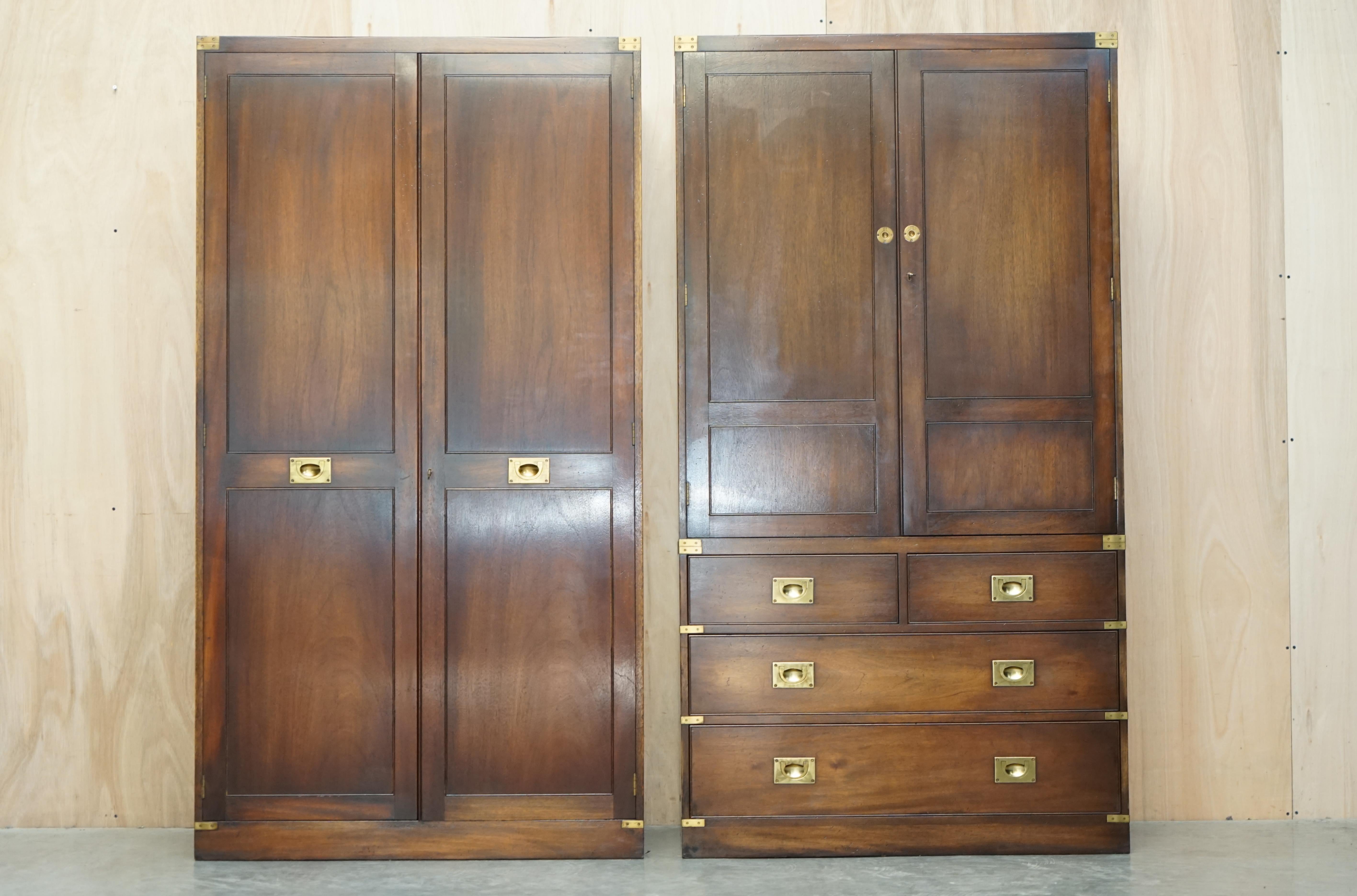 We are delighted to offer for sale this stunning pair of Vintage, Military Campaign, Mahogany & Brass wardrobes RRP £7999 each

This auction is for both wardrobes as pictured, one has a built in triple bank of drawers, the other is a full length
