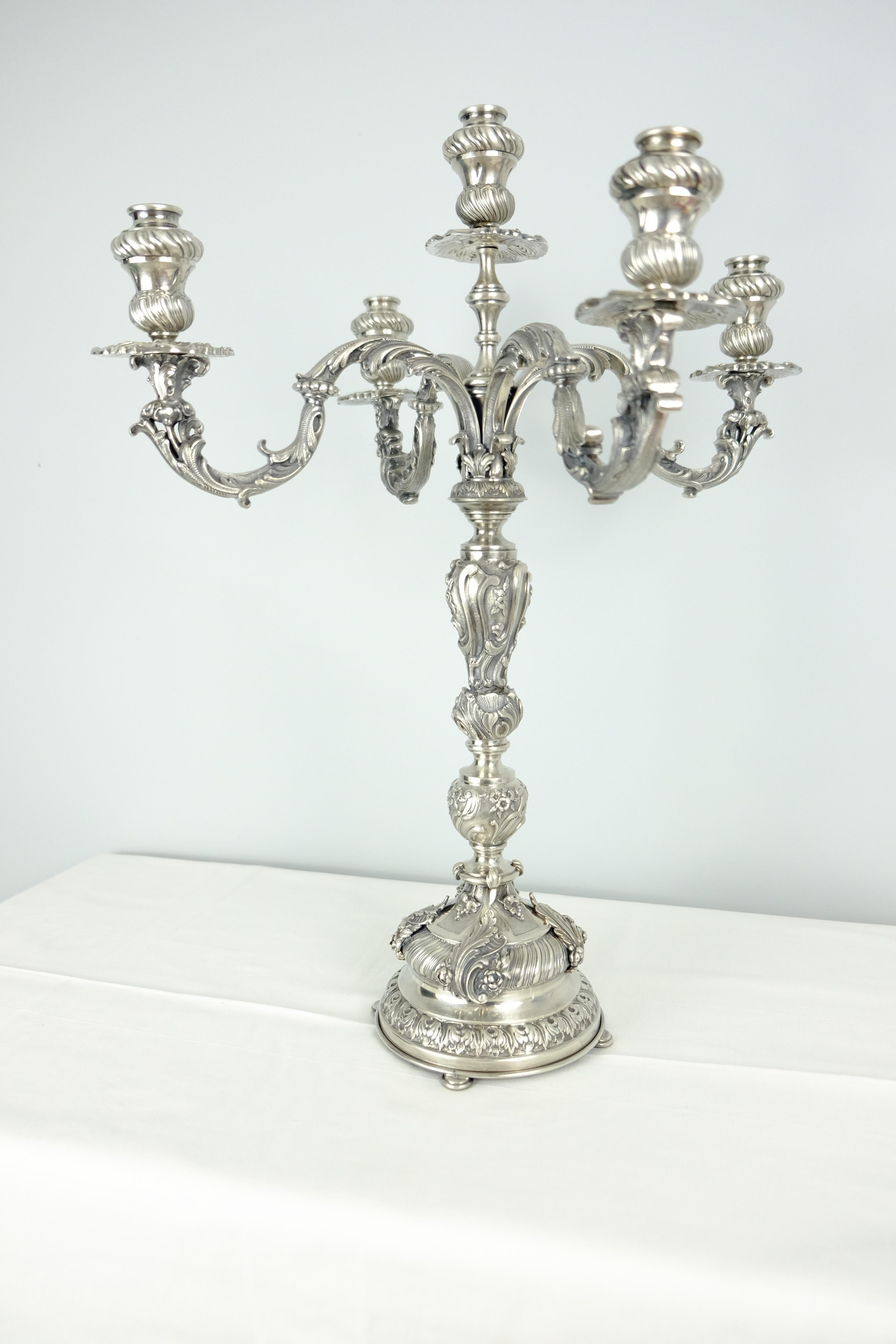 Pair of vintage solid sterling silver handmade Baroque candelabras made in Italy. These are solid .925 sterling silver not plated. IMA, manufactured by Argenteria Alessandria, of, Florence Italy. The combined weight of both is 19 lbs.

 