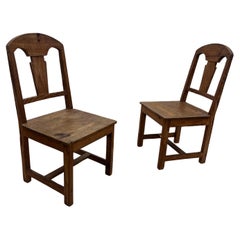 Pair of Vintage Spanish revival knotty Pine chairs